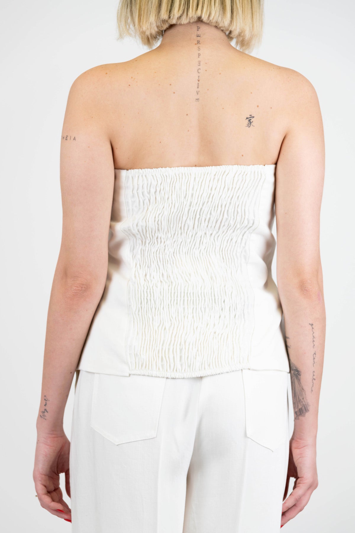 Tensione in - Top a fascia in tencel con arriccio ed elastico sul retro