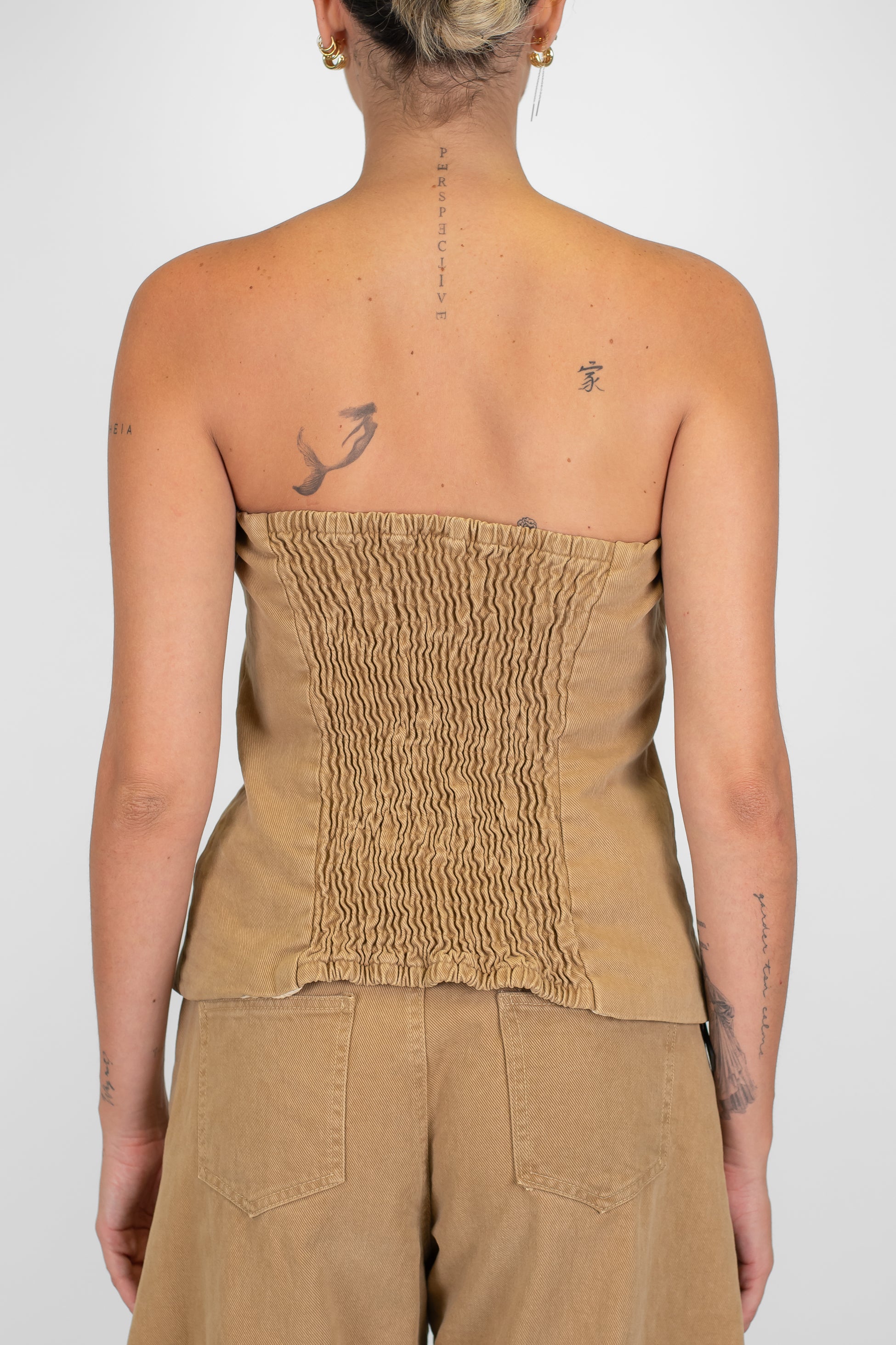 Tensione in - Top a fascia in denim colorato con elastico sul retro