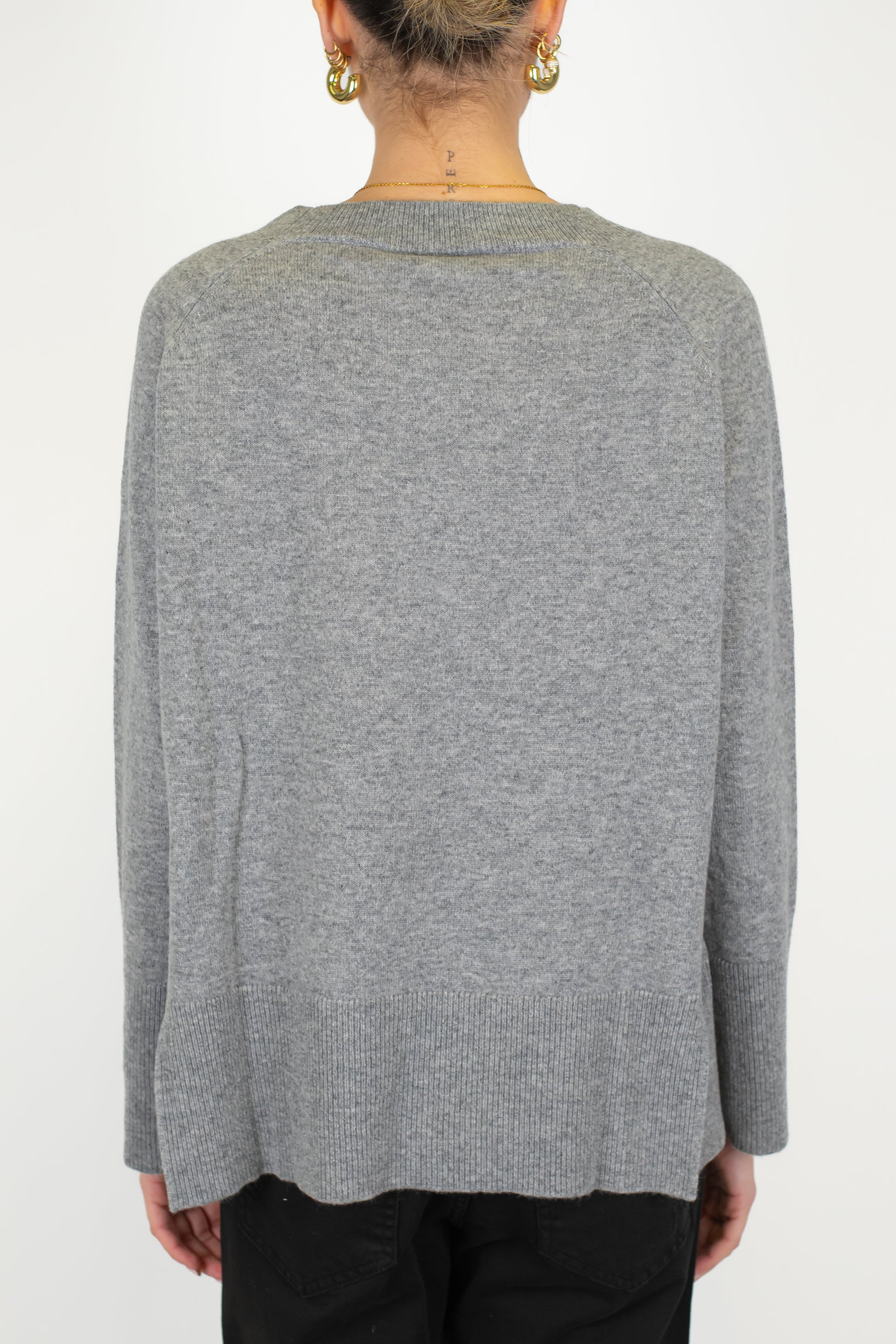 Tensione in - Maglia over in pura lana con spacchetti laterali