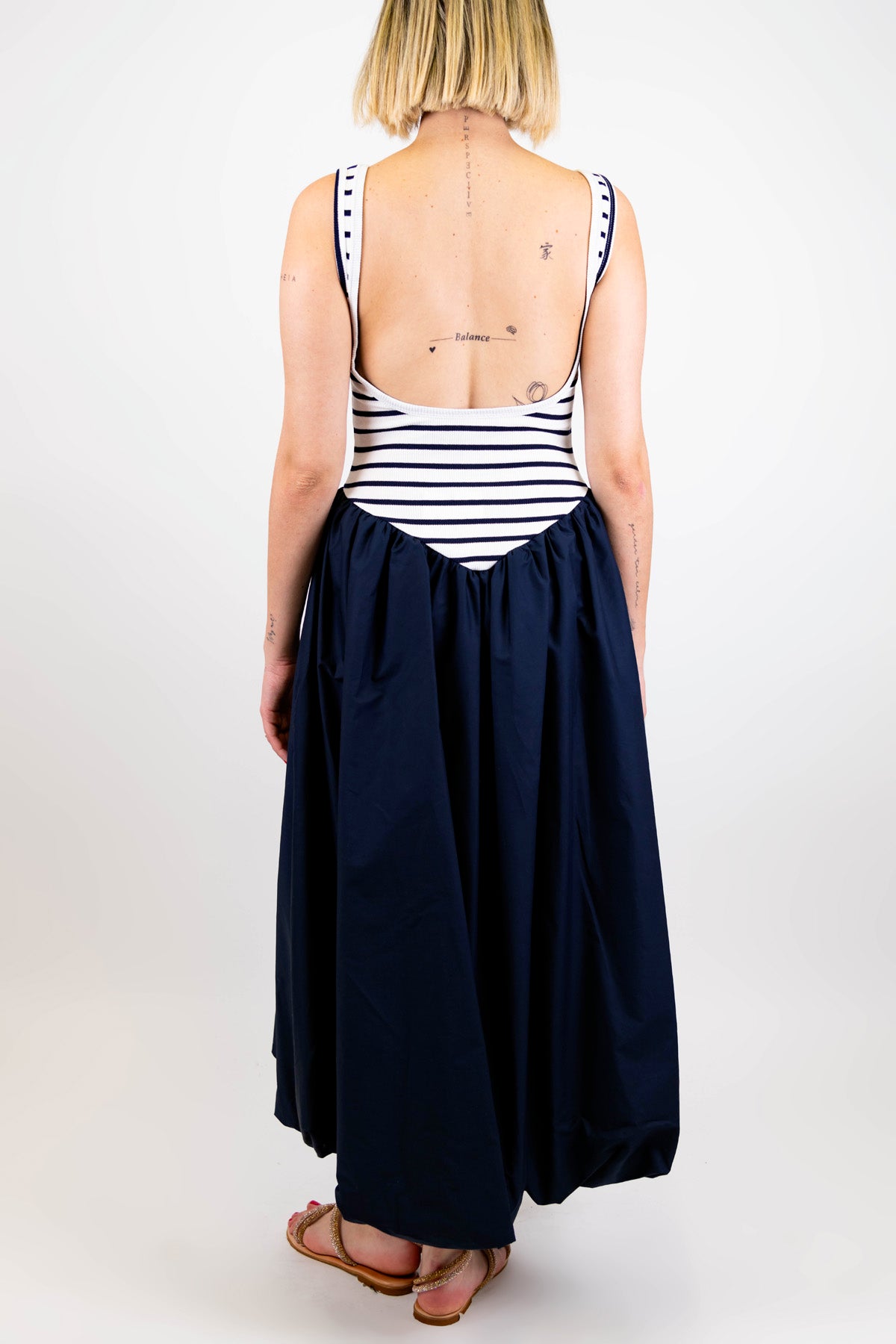 Tensione in - Abito lungo con canotta a costine fantasia righe e gonna tinta unita