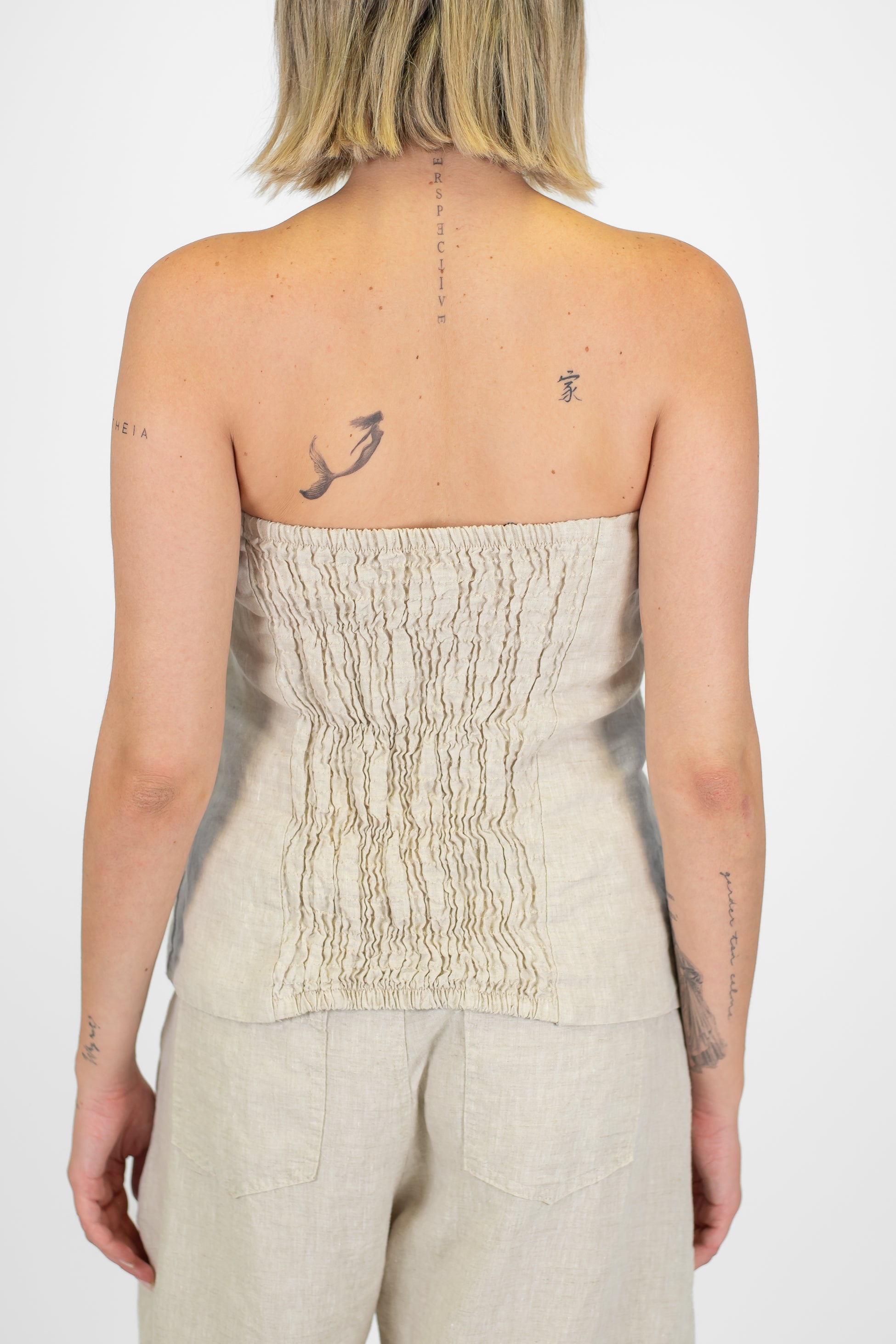 Tensione in - Top a fascia in puro lino