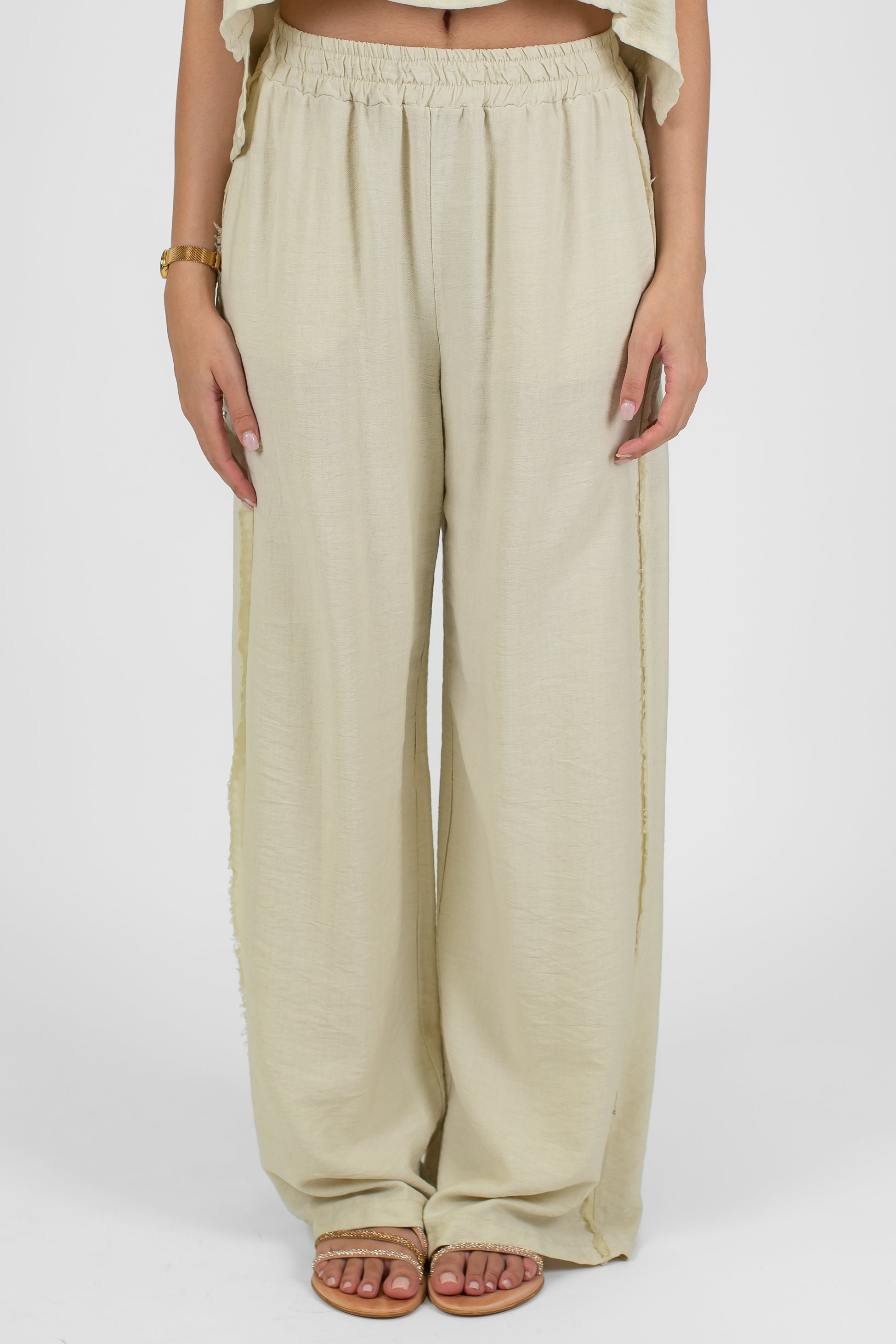 Tensione in - Pantalone palazzo in viscosa leggera con banda laterale sfrangiata ed elastico in vita