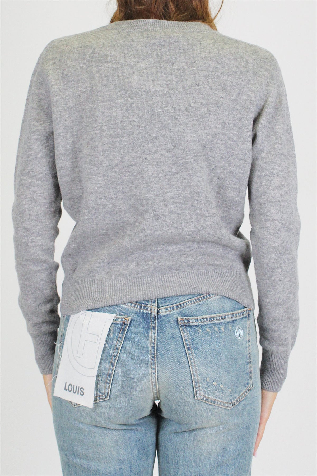 Tensione in - Maglia scollo a V in pura lana