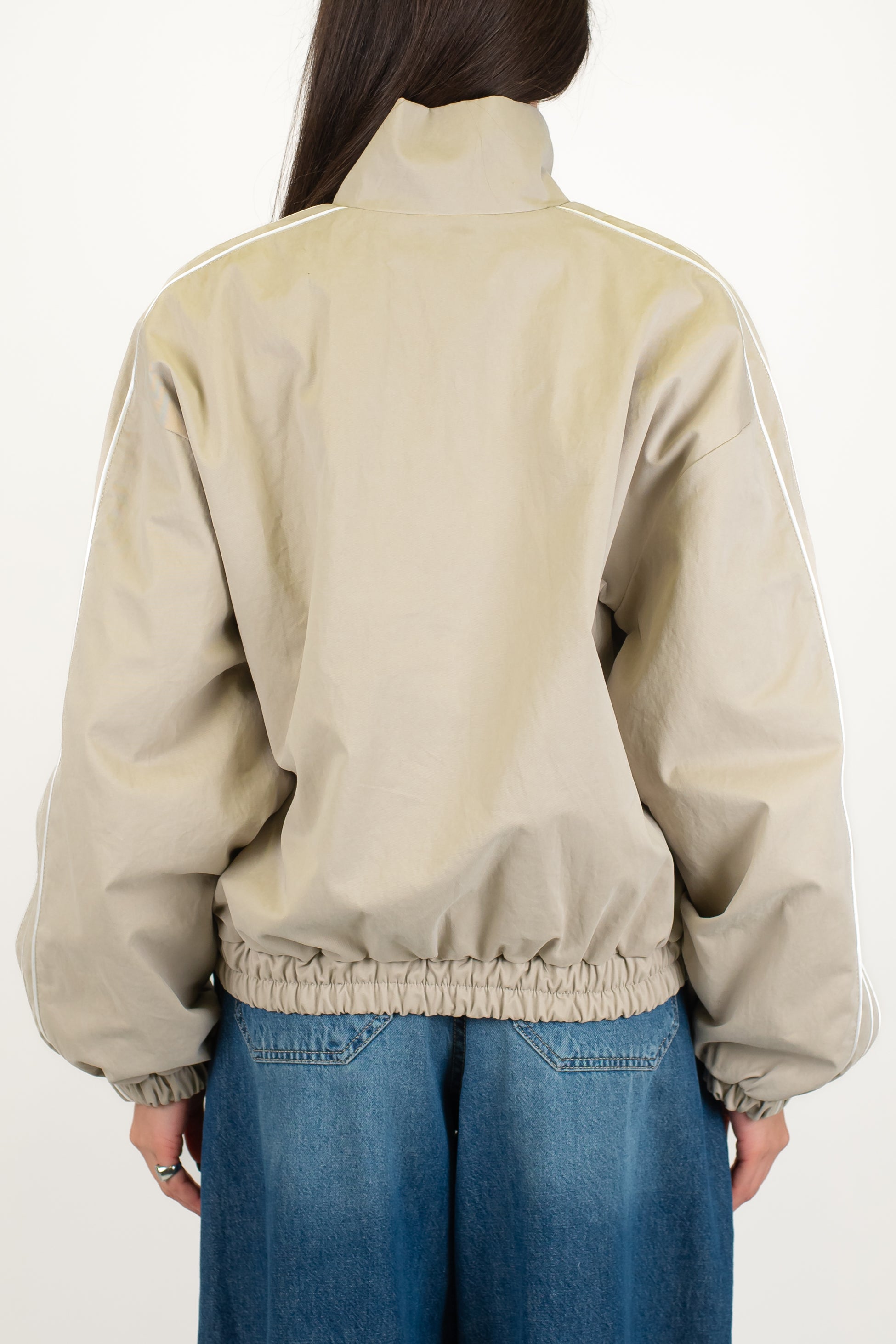 Tensione in - Bomber con chiusura zip e alamari ed elastico sul fondo
