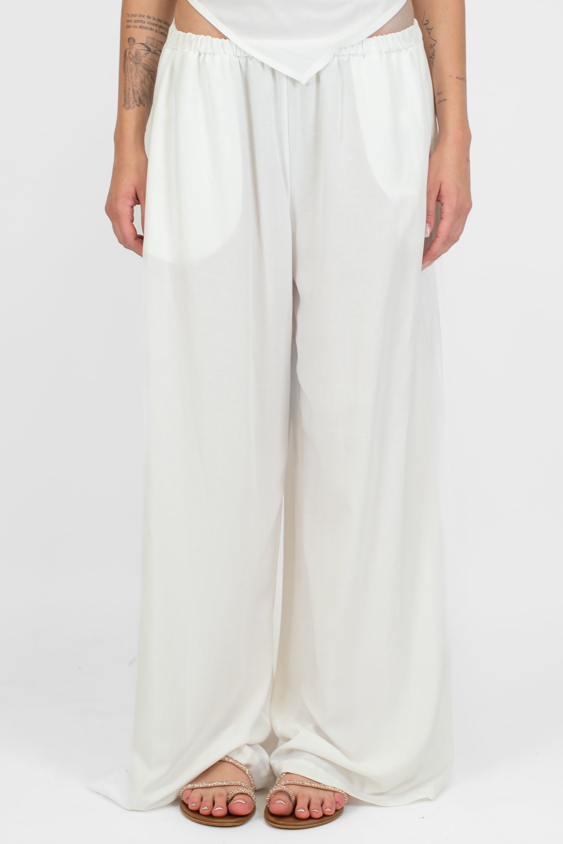 Tensione in - Coordinato in misto lino con allaccio sul retro e pantalone palazzo con elastico in vita