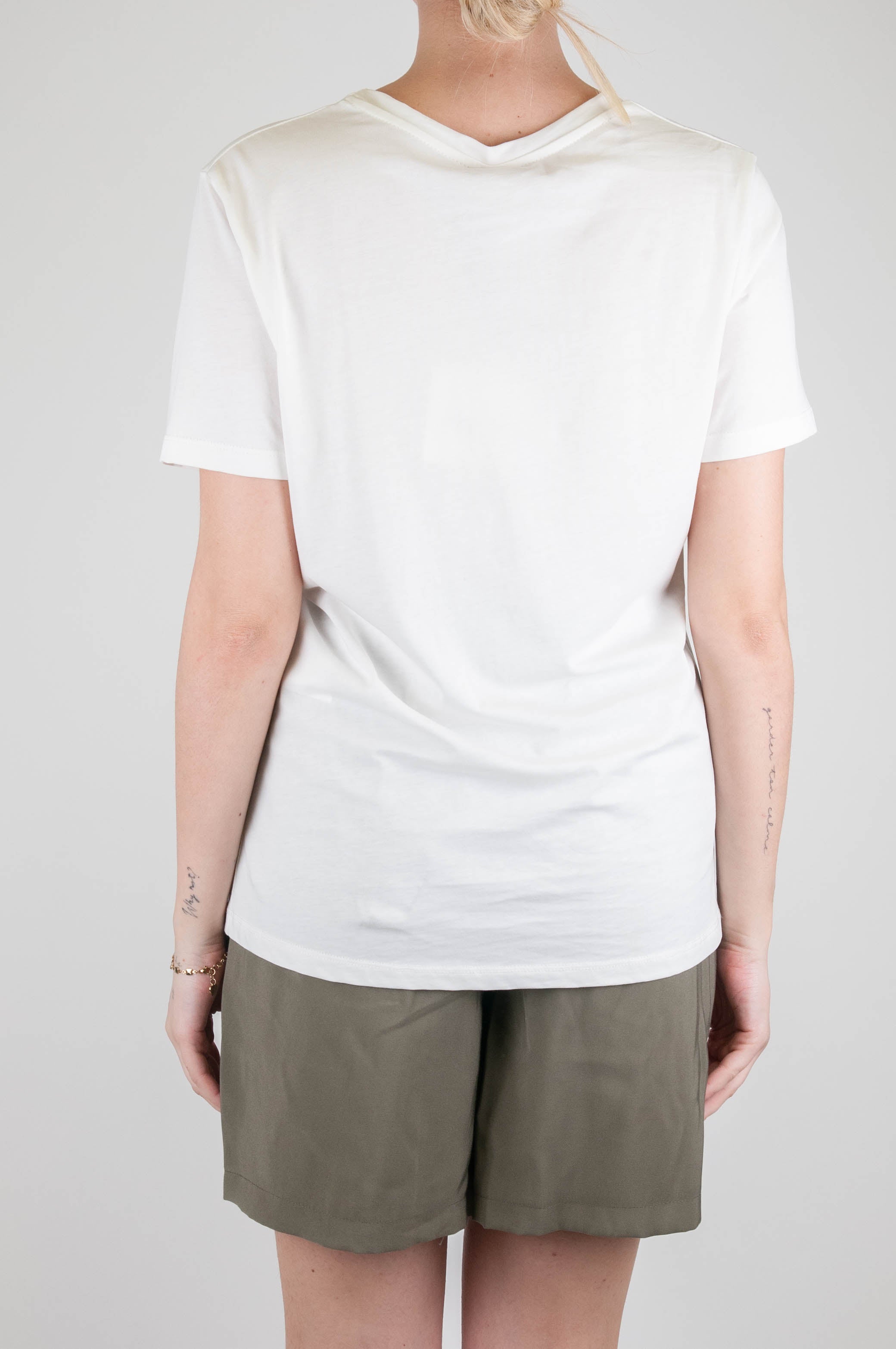 Tension in - T-shirt with fake pocket and jewel buttons