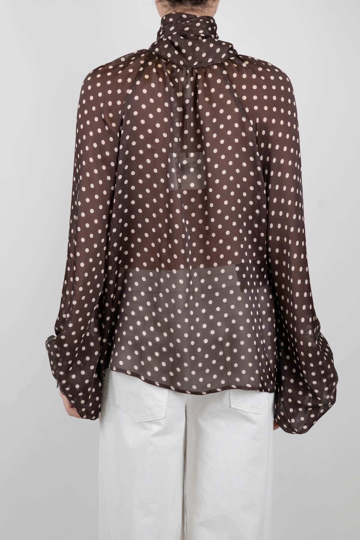 Tensione in - Blusa fantasia pois con fiocco al collo