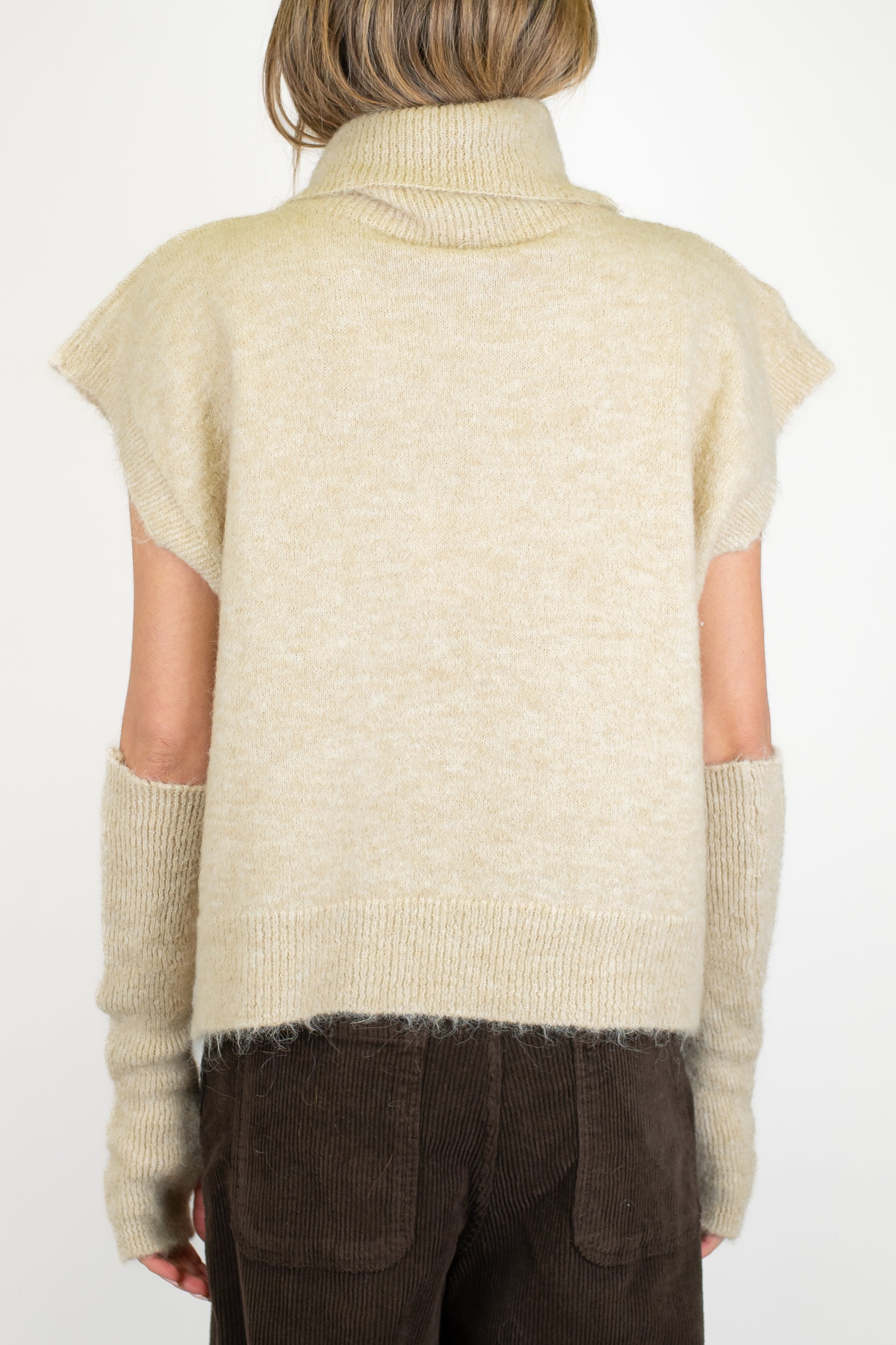 Tensione in - Dolvecita giromaniche in misto lana con manicotti