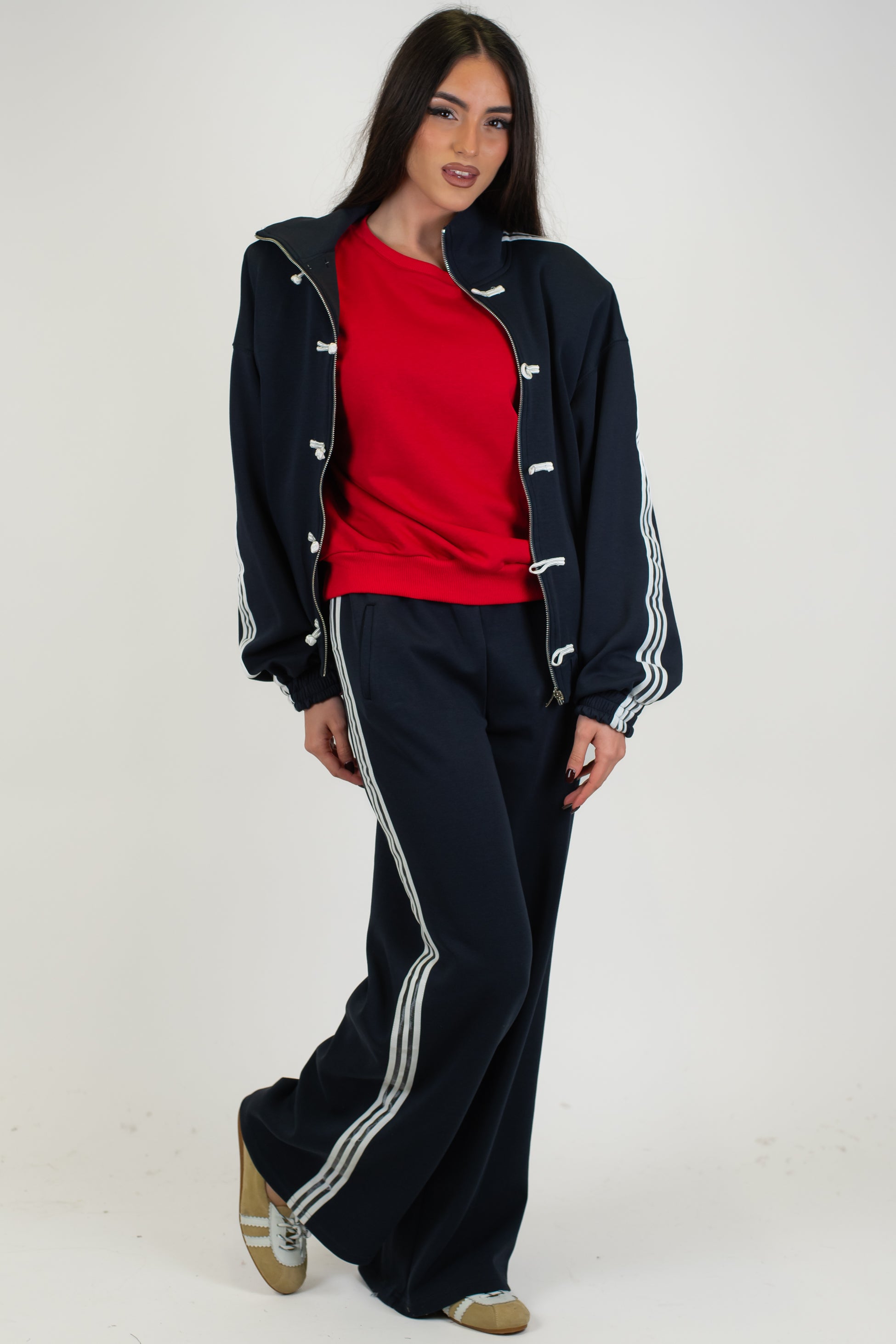 Tensione in - Felpa con alamari e chiusura zip