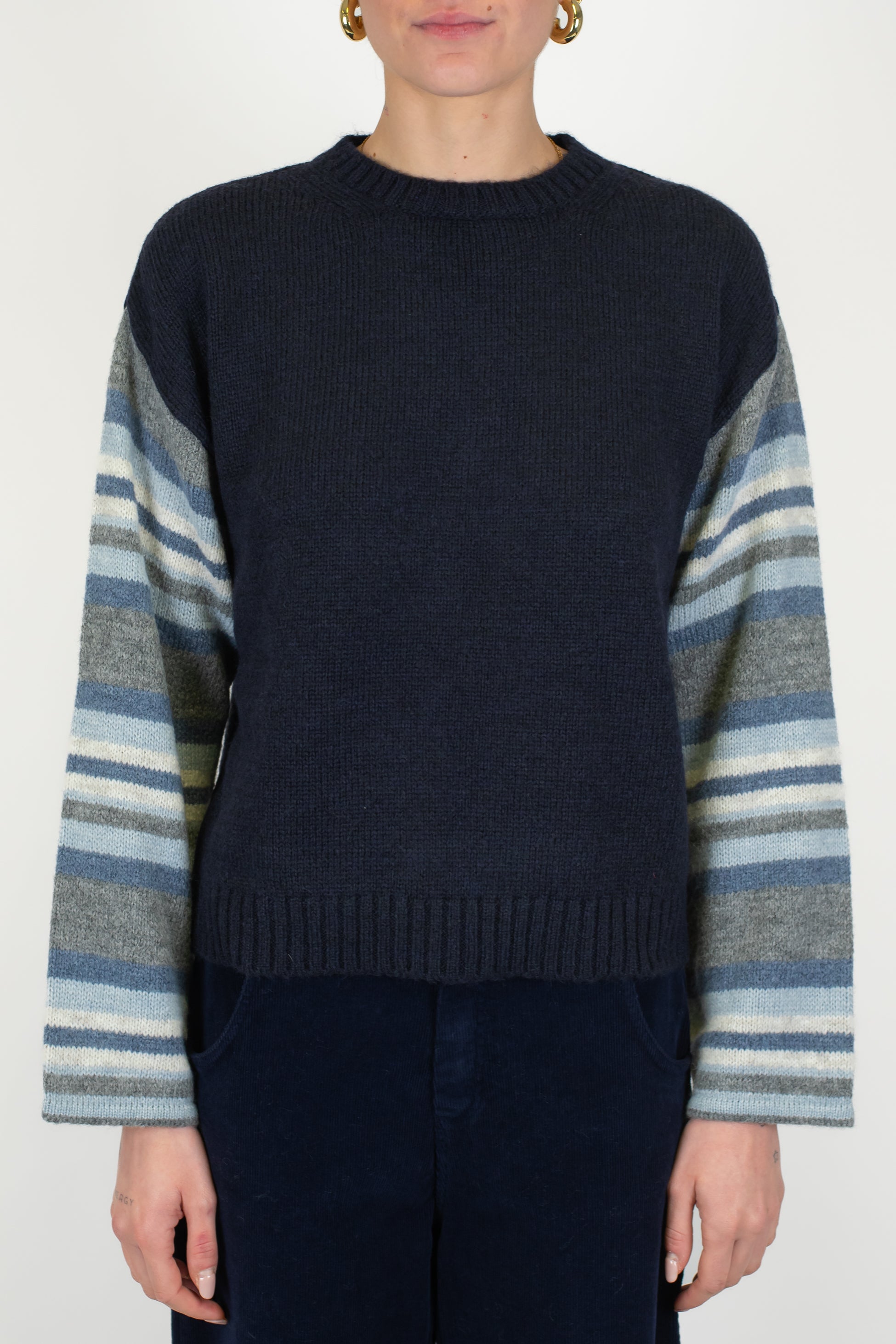 Tensione in - Maglia over con manica fantasia righe a contrasto in misto lana