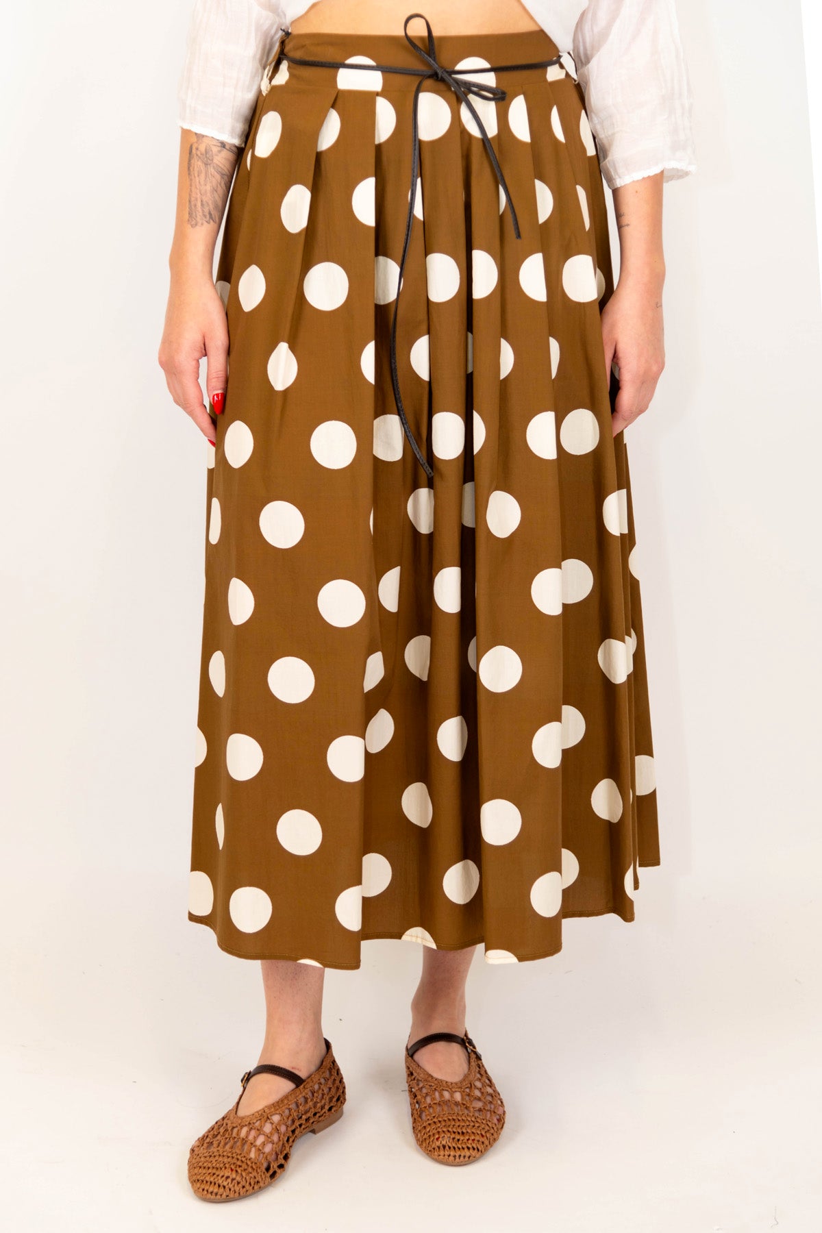 Tensione in - Gonna fantasia pois con pieghe ed elastico sul retro