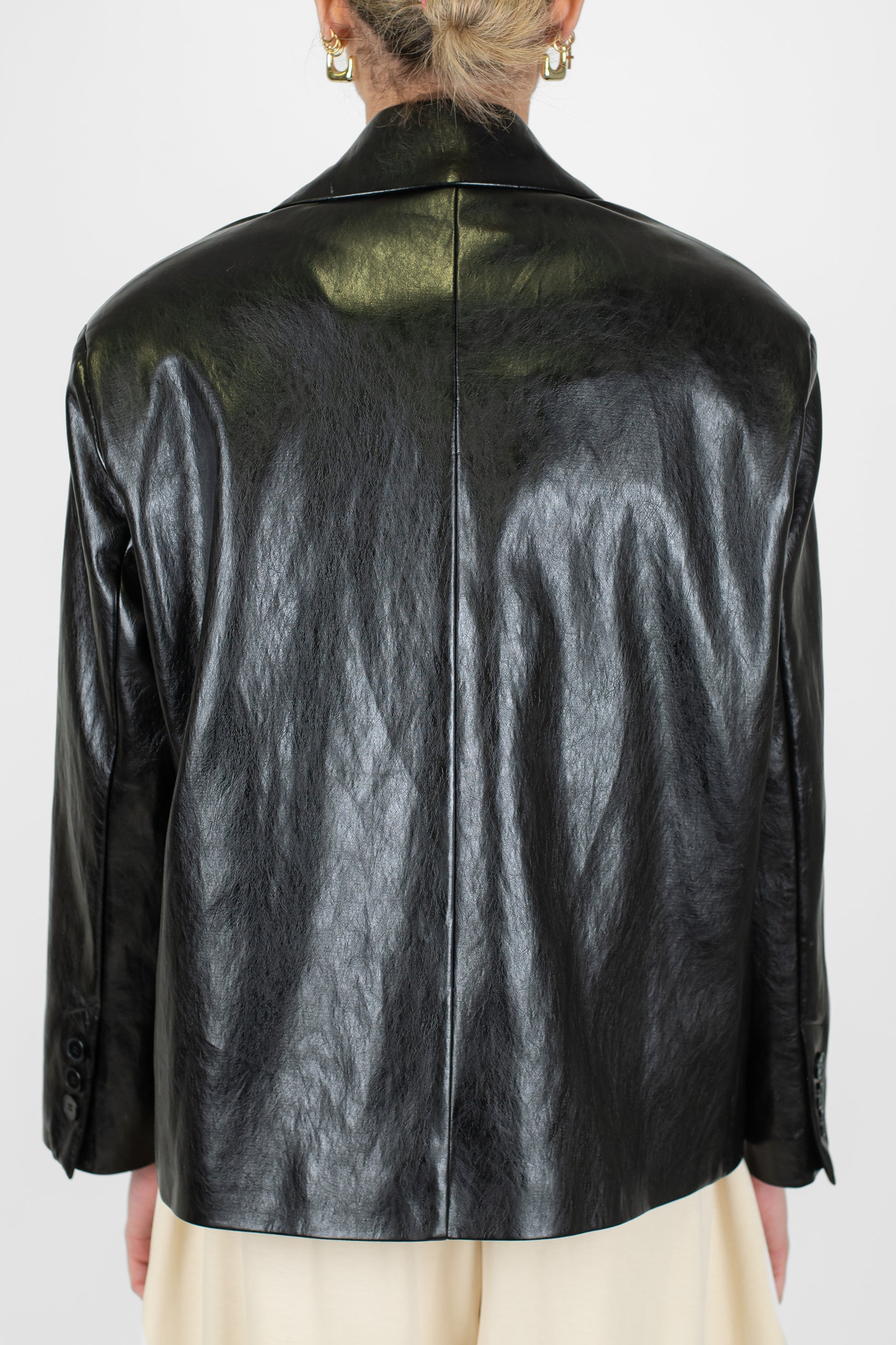 Tensione in - Giacca doppiopetto in ecopelle