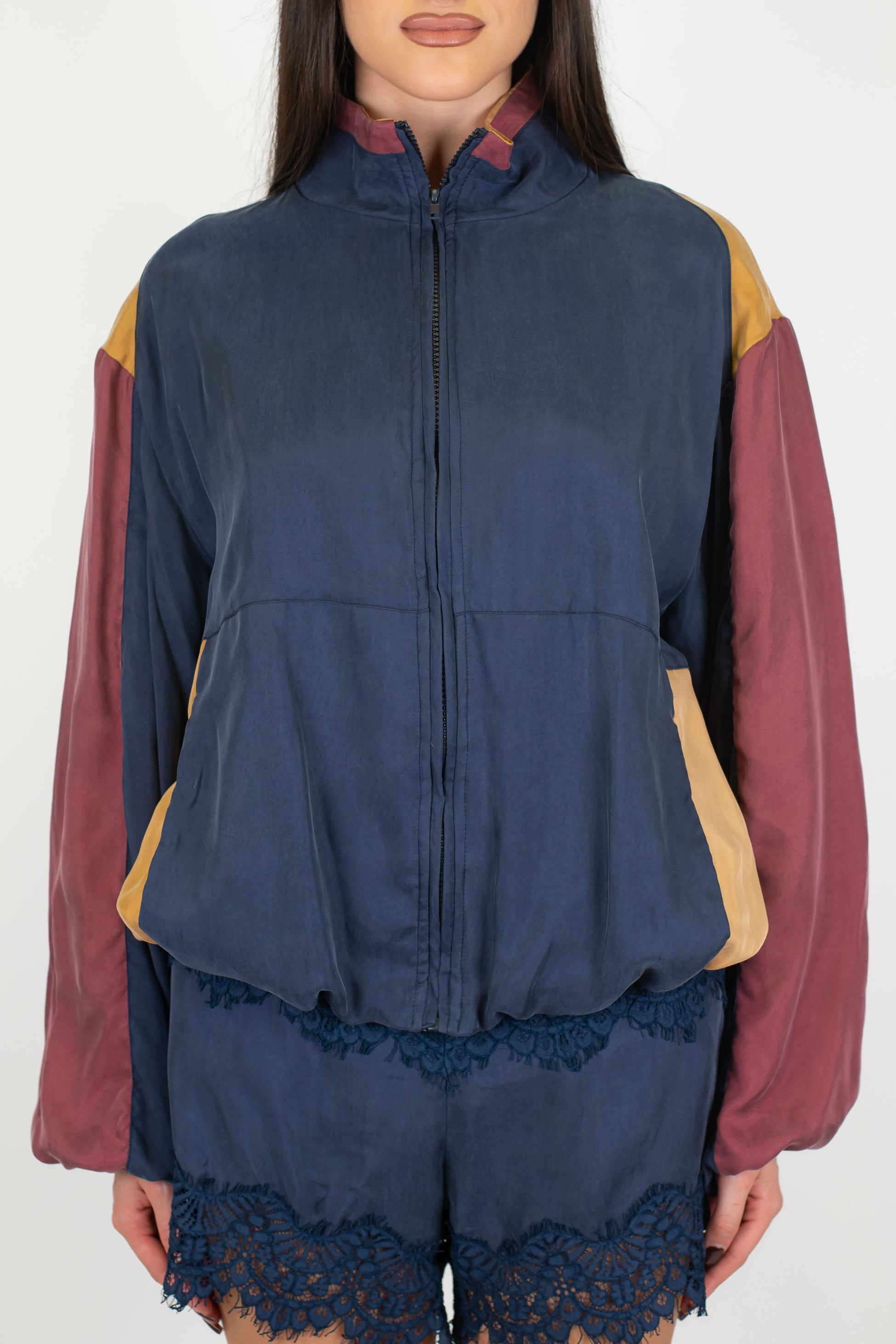 Tensione in - Bomber in cupro con maniche a contrasto ed elastico sul fondo