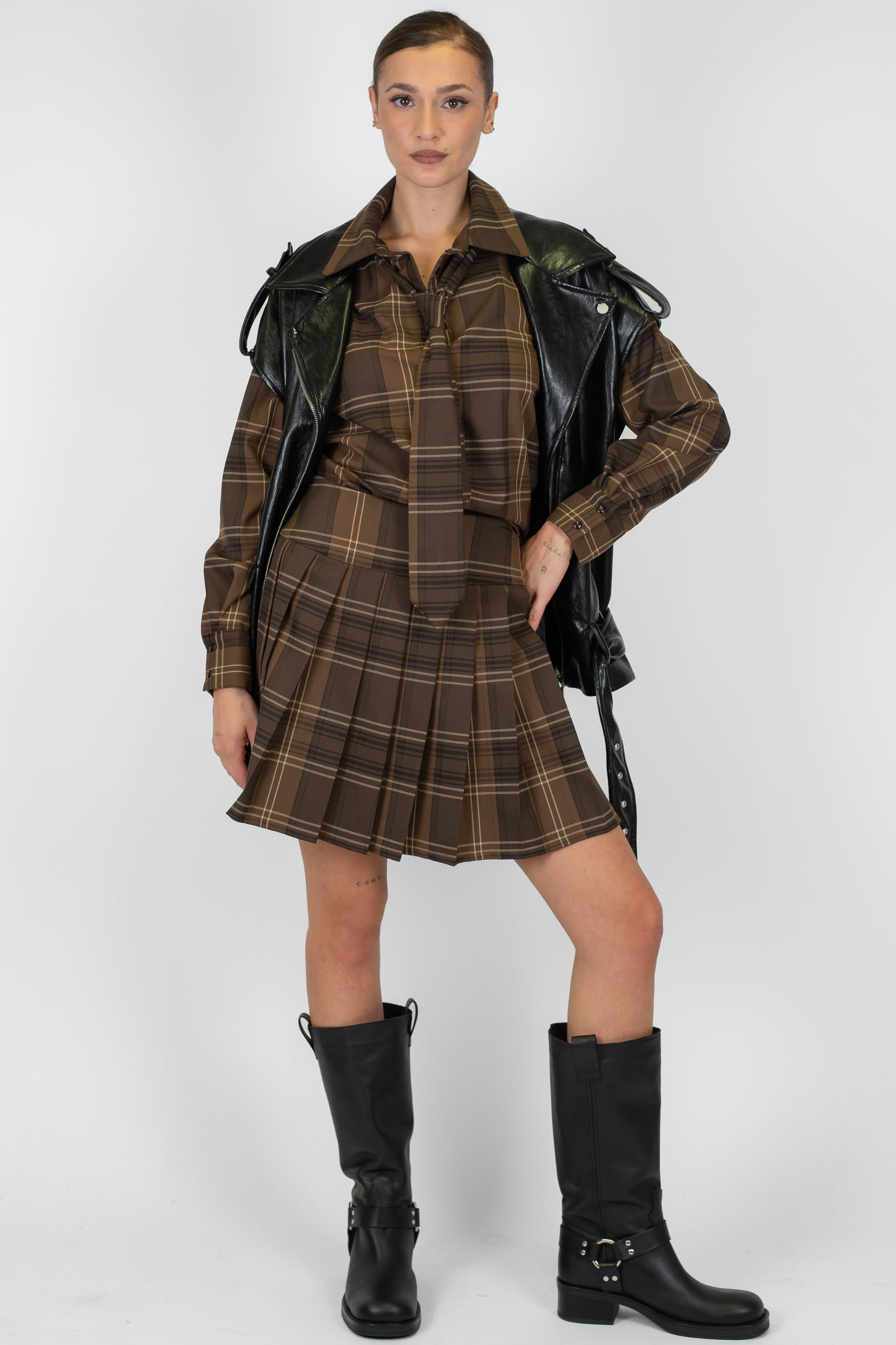 Tensione in - Minigonna fantasia check plissé con chiusura zip laterale