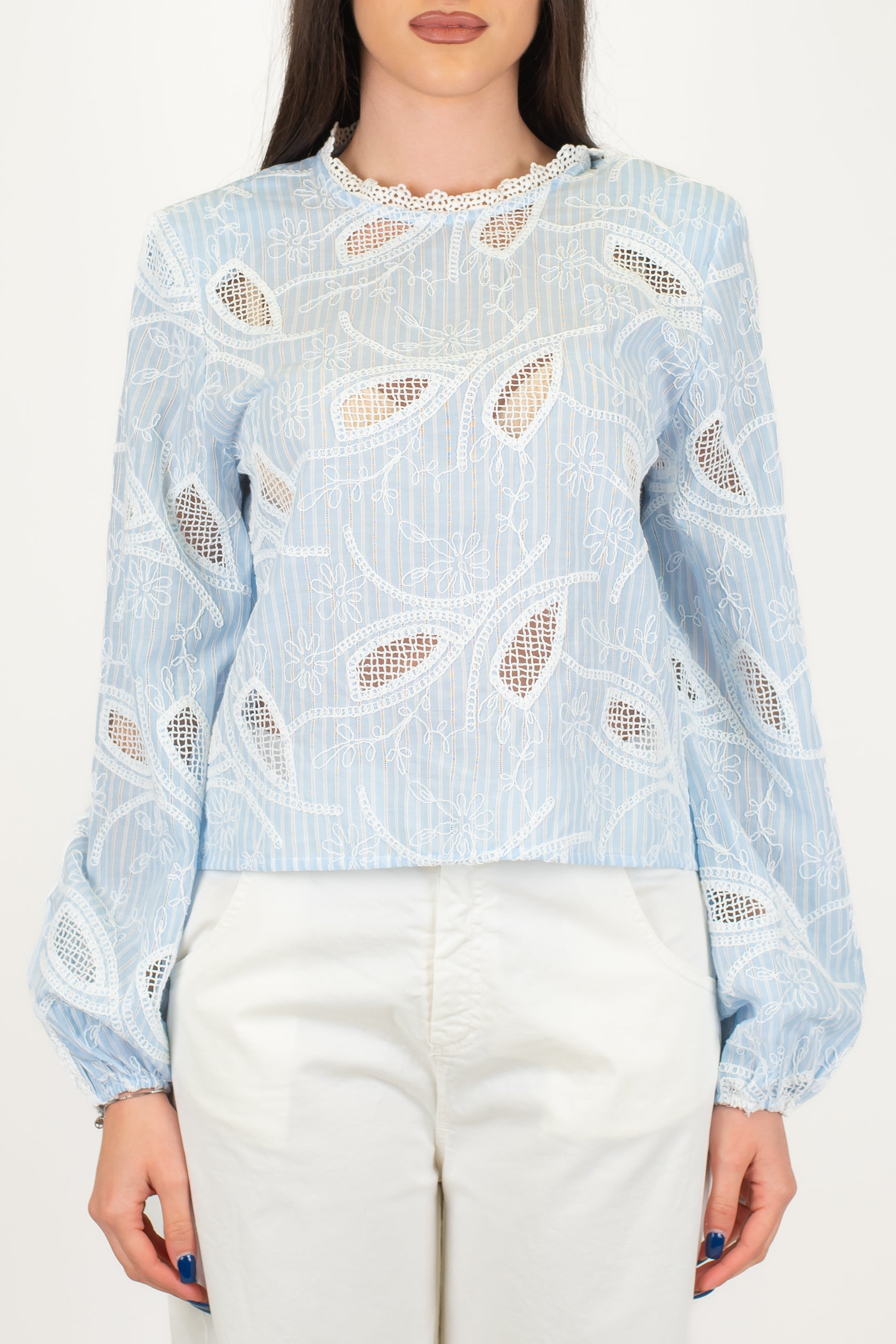 Tensione in - Blusa fantasia floreale con dettagli in pizzo