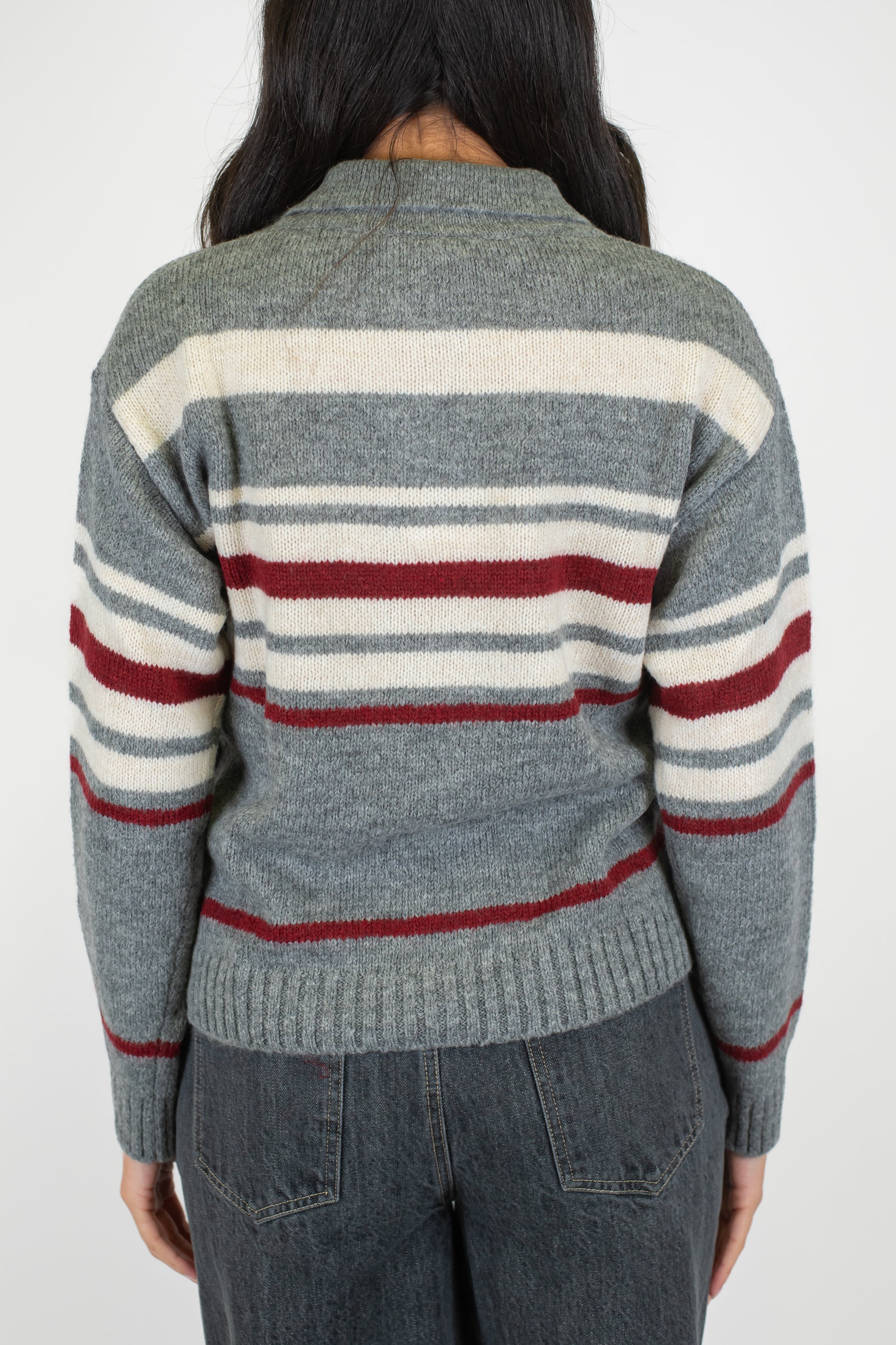 Tensione in - Polo in maglia fantasia rigata a contrasto in misto lana