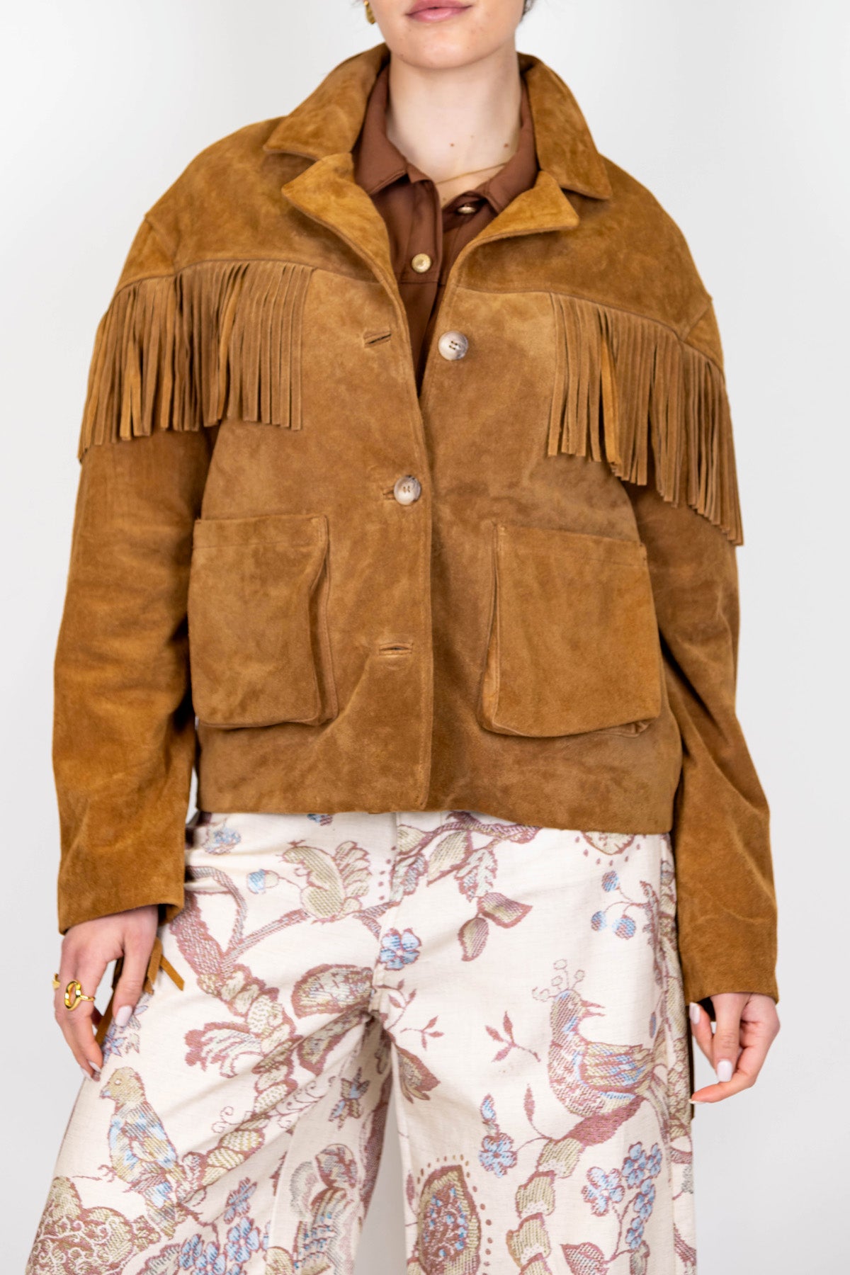 Tensione in - Giacca in camoscio con frange su fronte e maniche