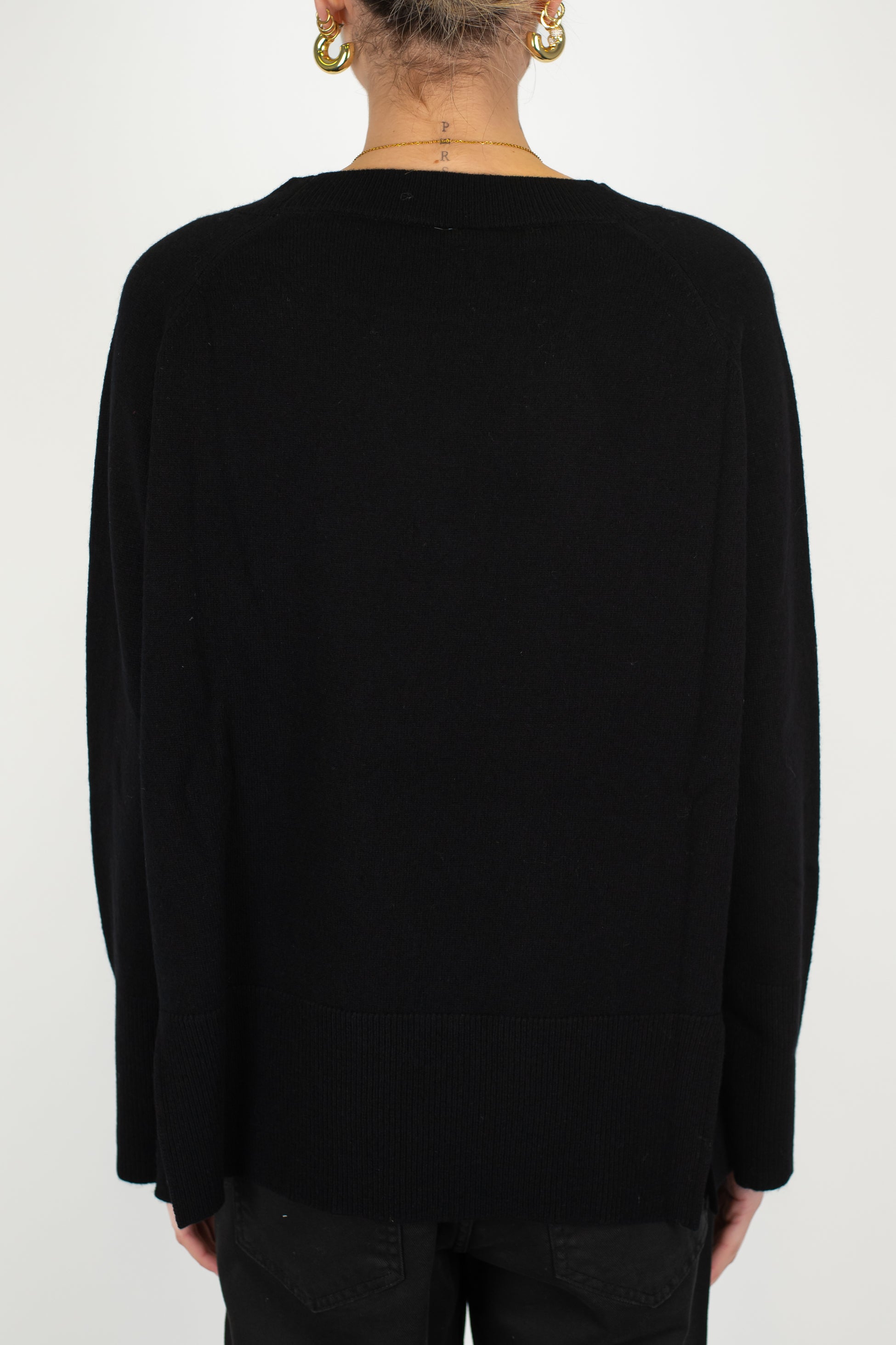 Tensione in - Maglia over in pura lana con spacchetti laterali