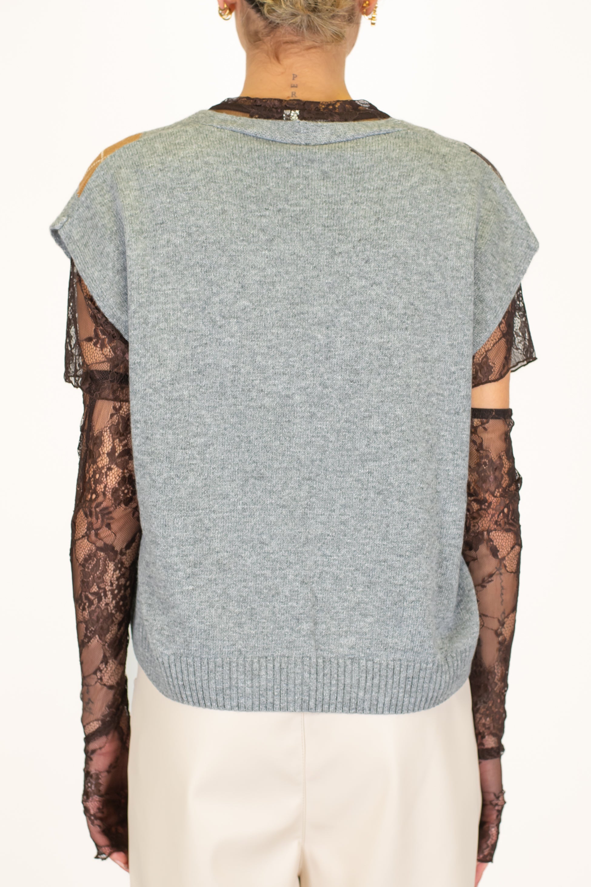 Tensione in - Gilet in maglia fantasia rombi a contrasto