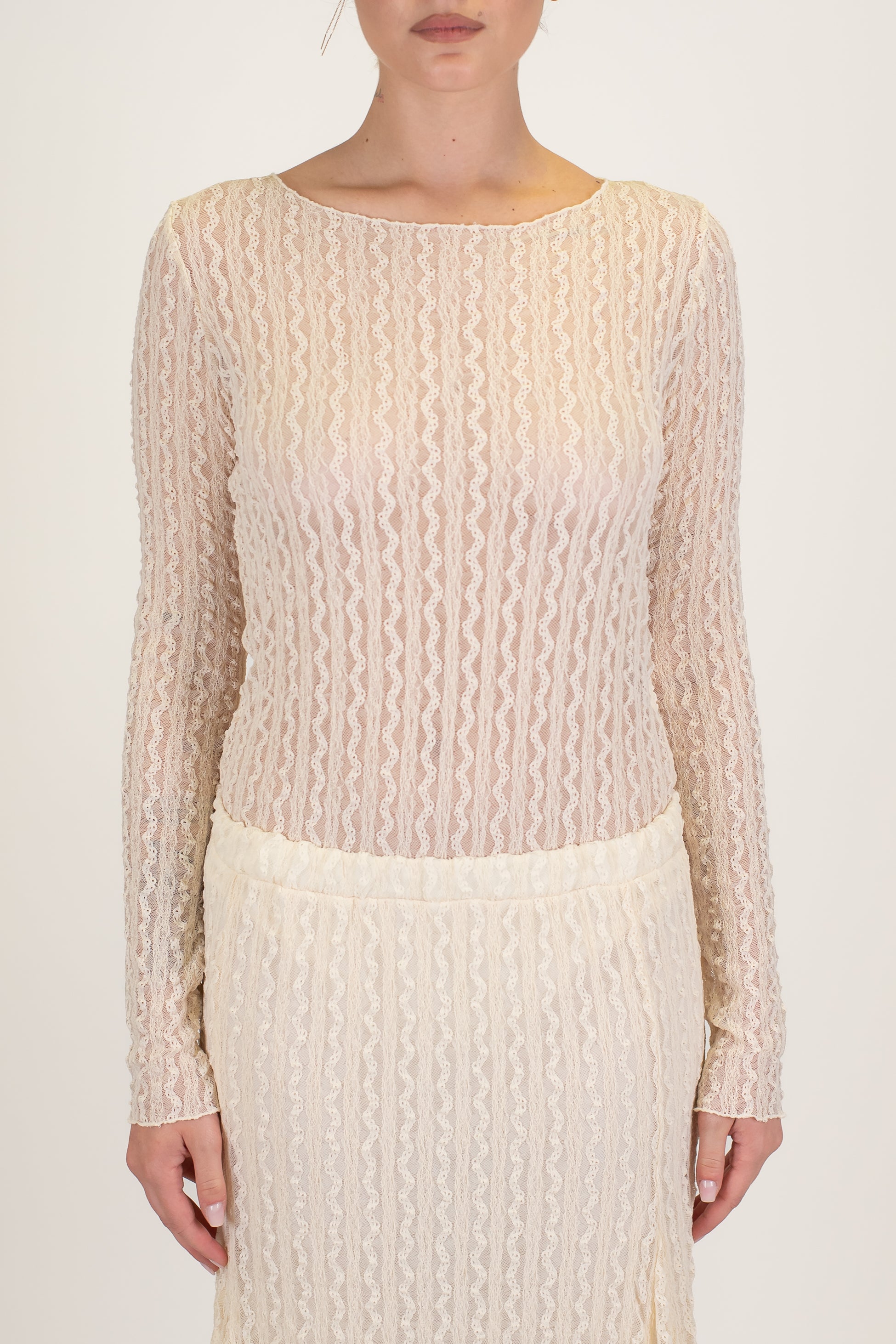 Tensione in - Body girocollo in crochet con manica lunga