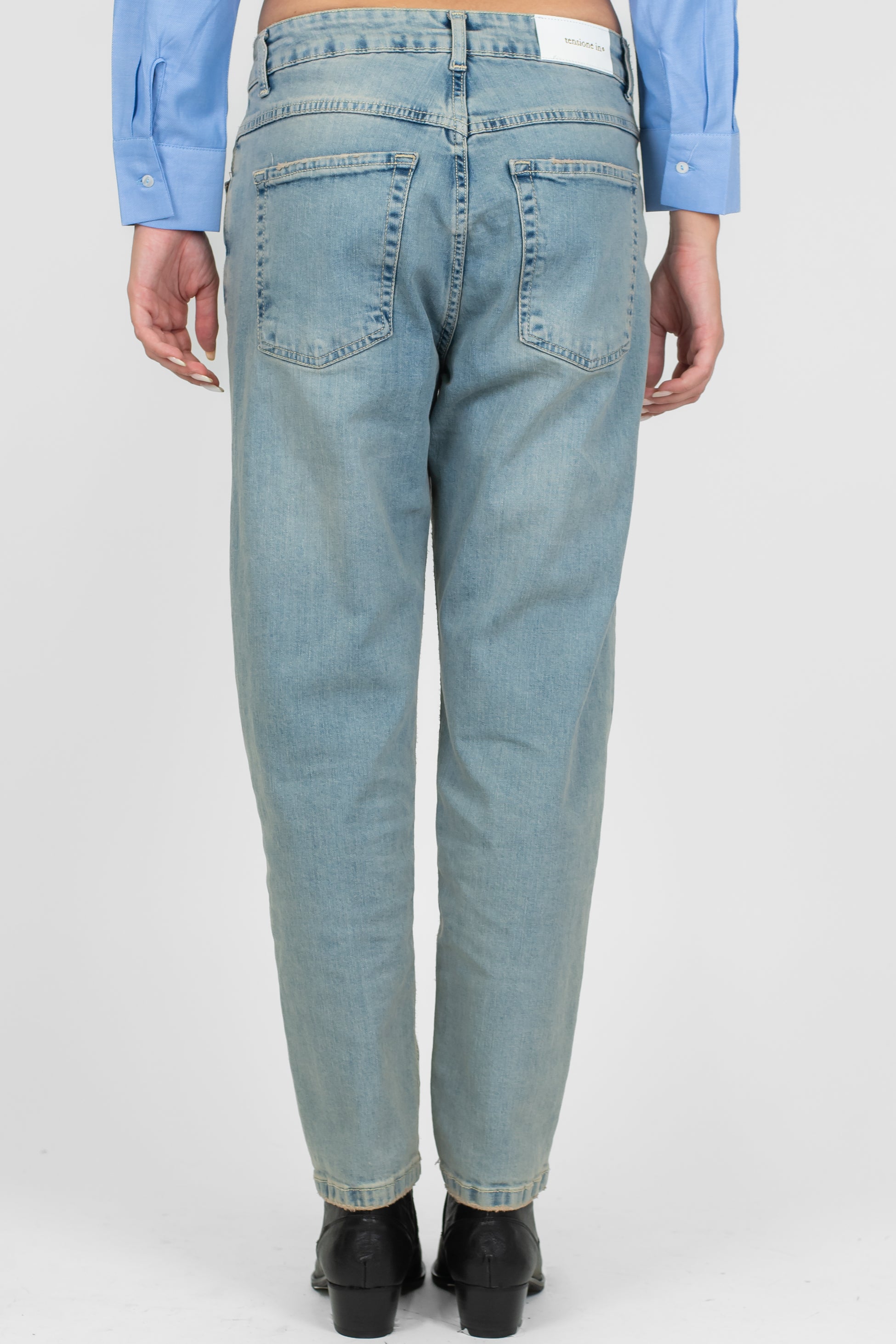 Tensione in - Jeans slim lavaggio sabbiato
