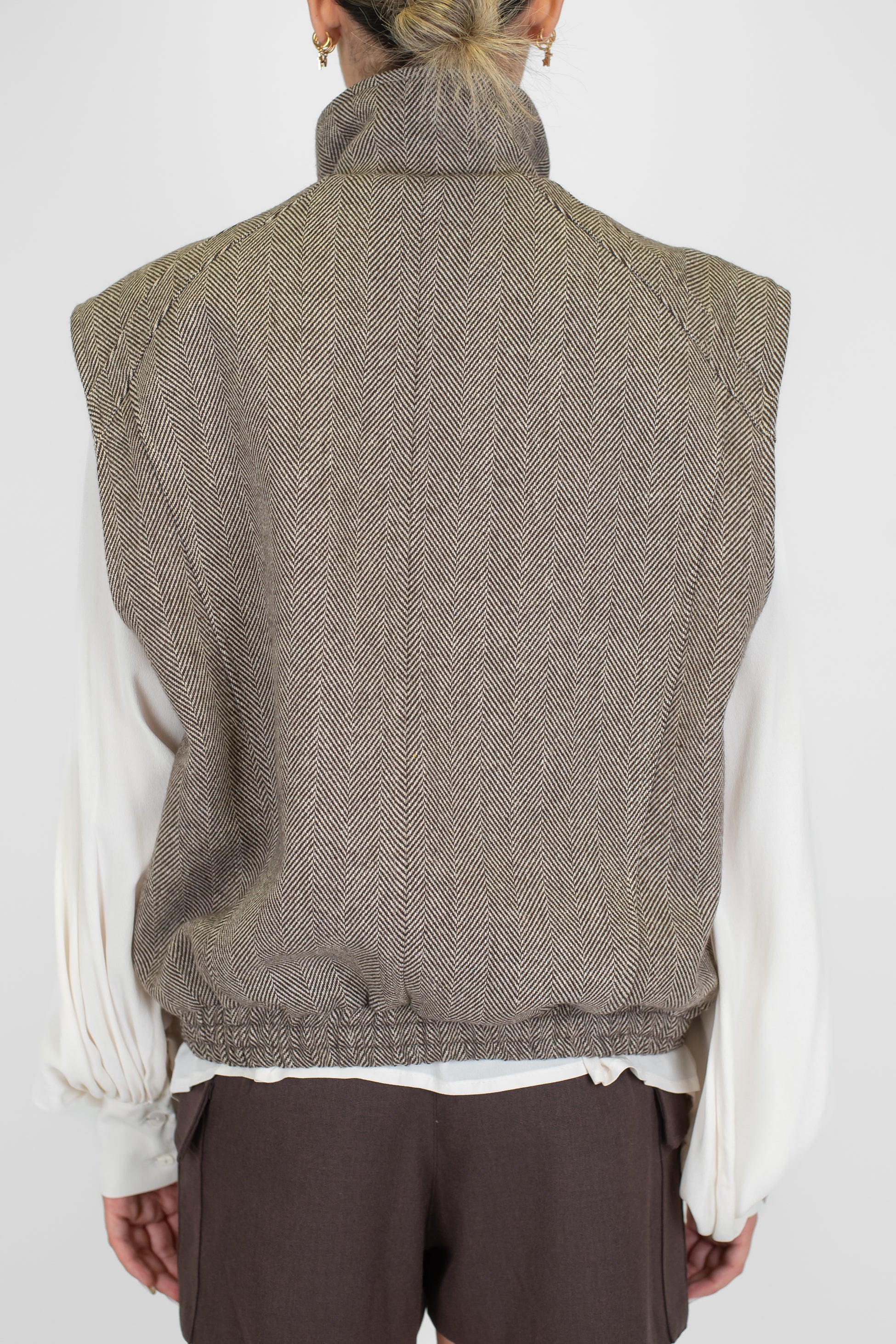 Tensione in - Bomber giromaniche fantasia spigata in misto lana con tasconi e doppia abbottonatura