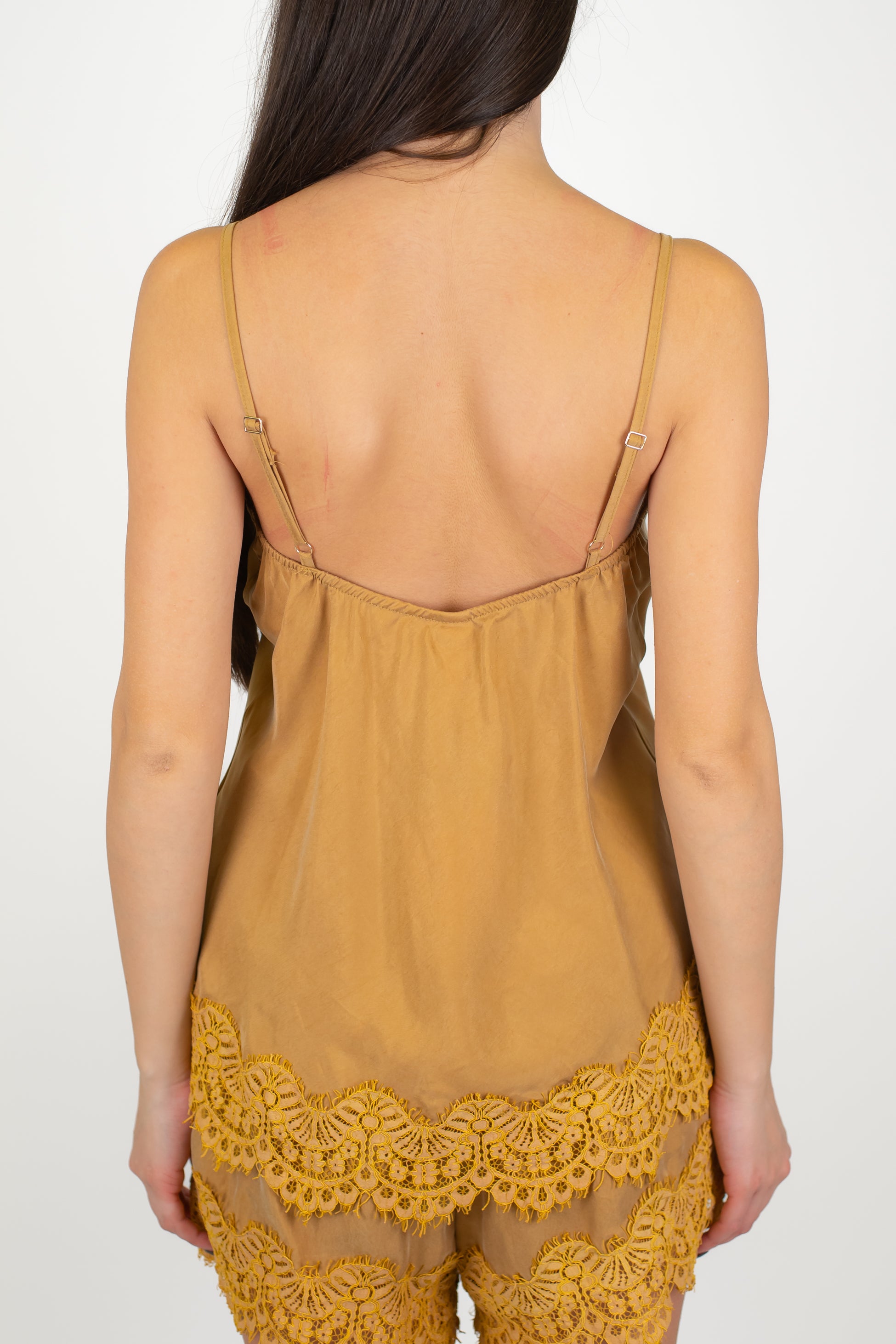 Tensione in - Top in cupro con dettagli in pizzo