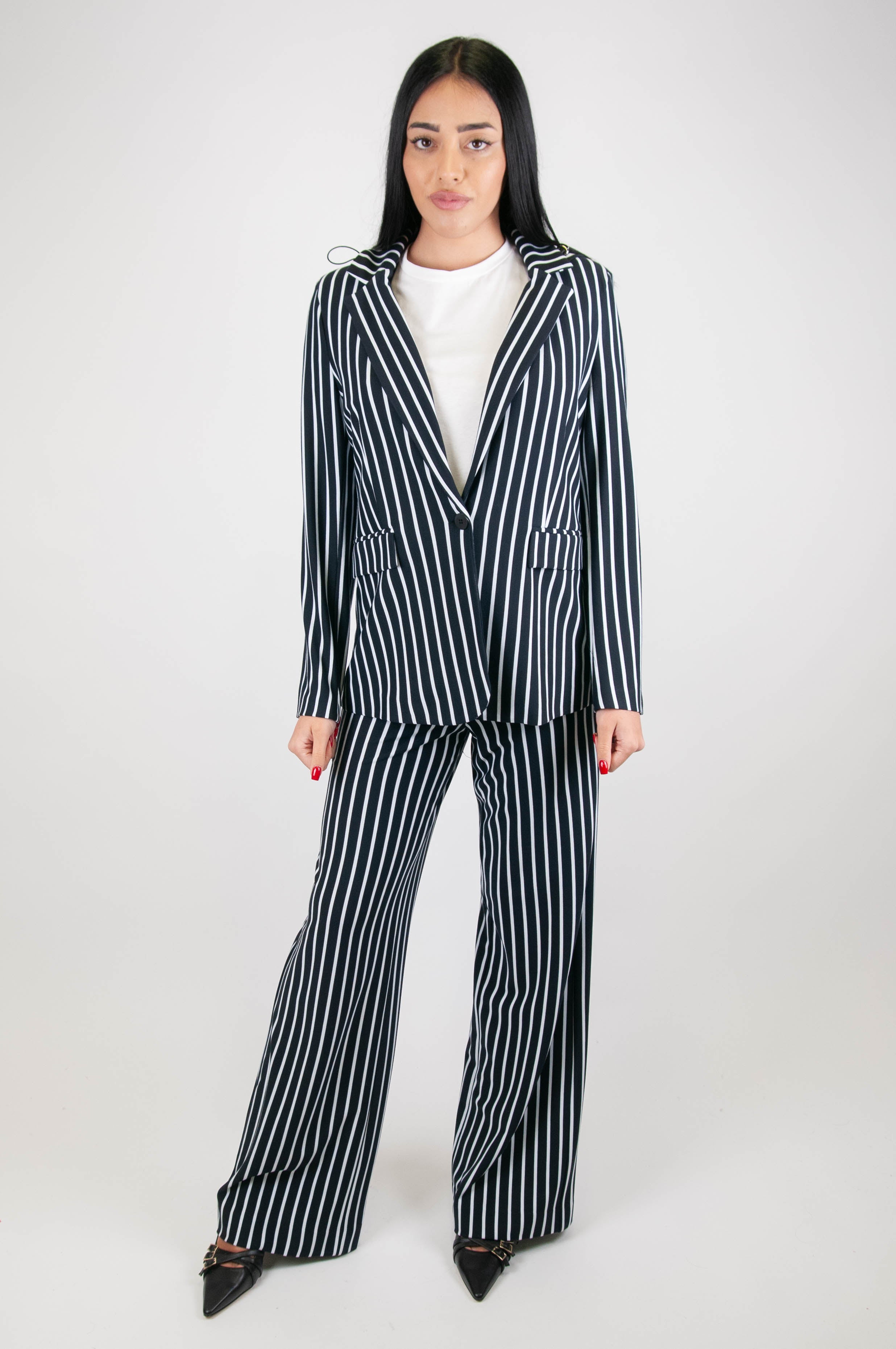 Tension in - Striped palazzo trousers with front pockets and buttons