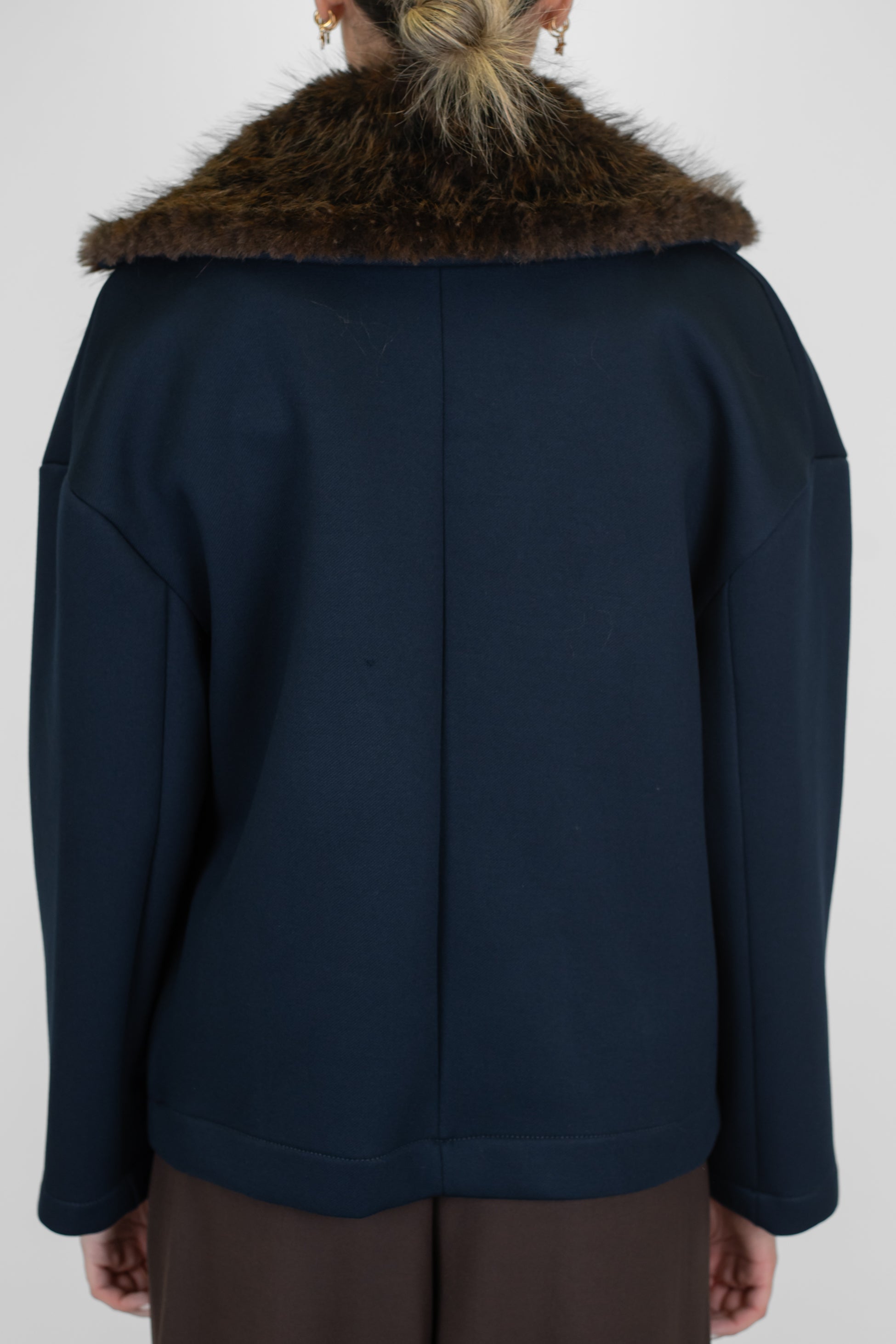 Tensione in - Cappetta doppiopetto in neoprene con collo in ecopelliccia