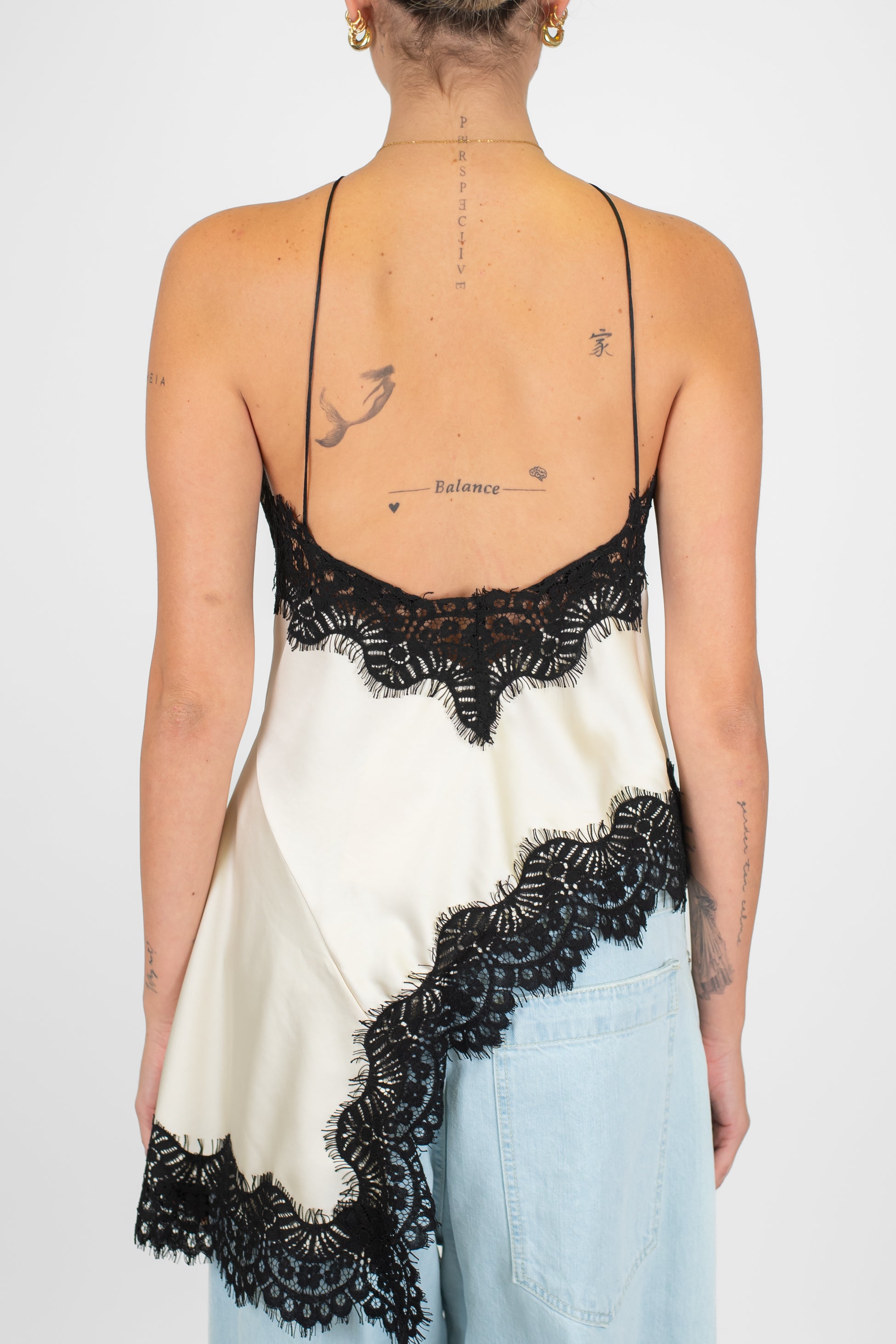 Motel - Top asimmetrico in satin con orli in pizzo a contrasto