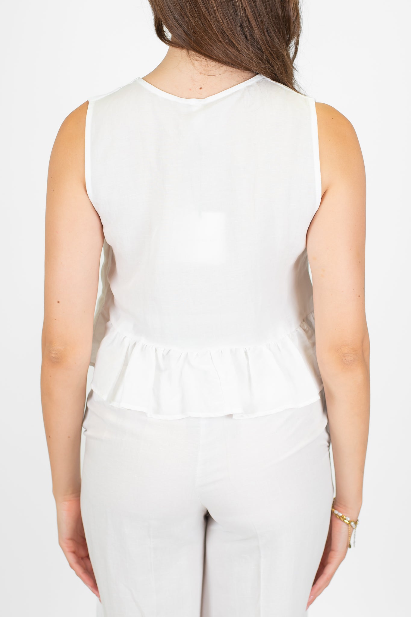 Tensione in - Gilet in misto lino e viscosa con chiusura laccetti e balza sul fondo