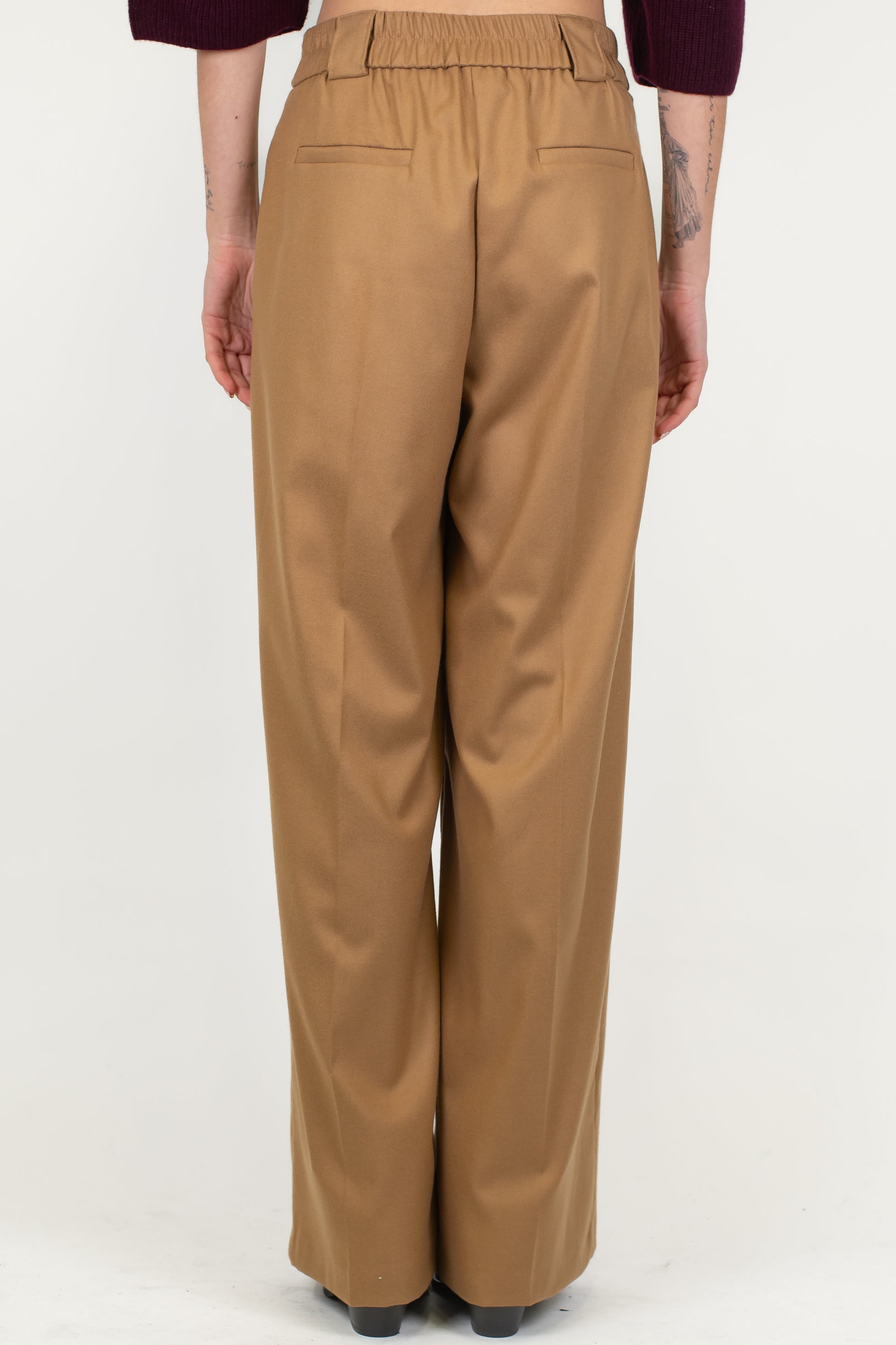 Tensione in - Pantalone palazzo con elastico sul retro