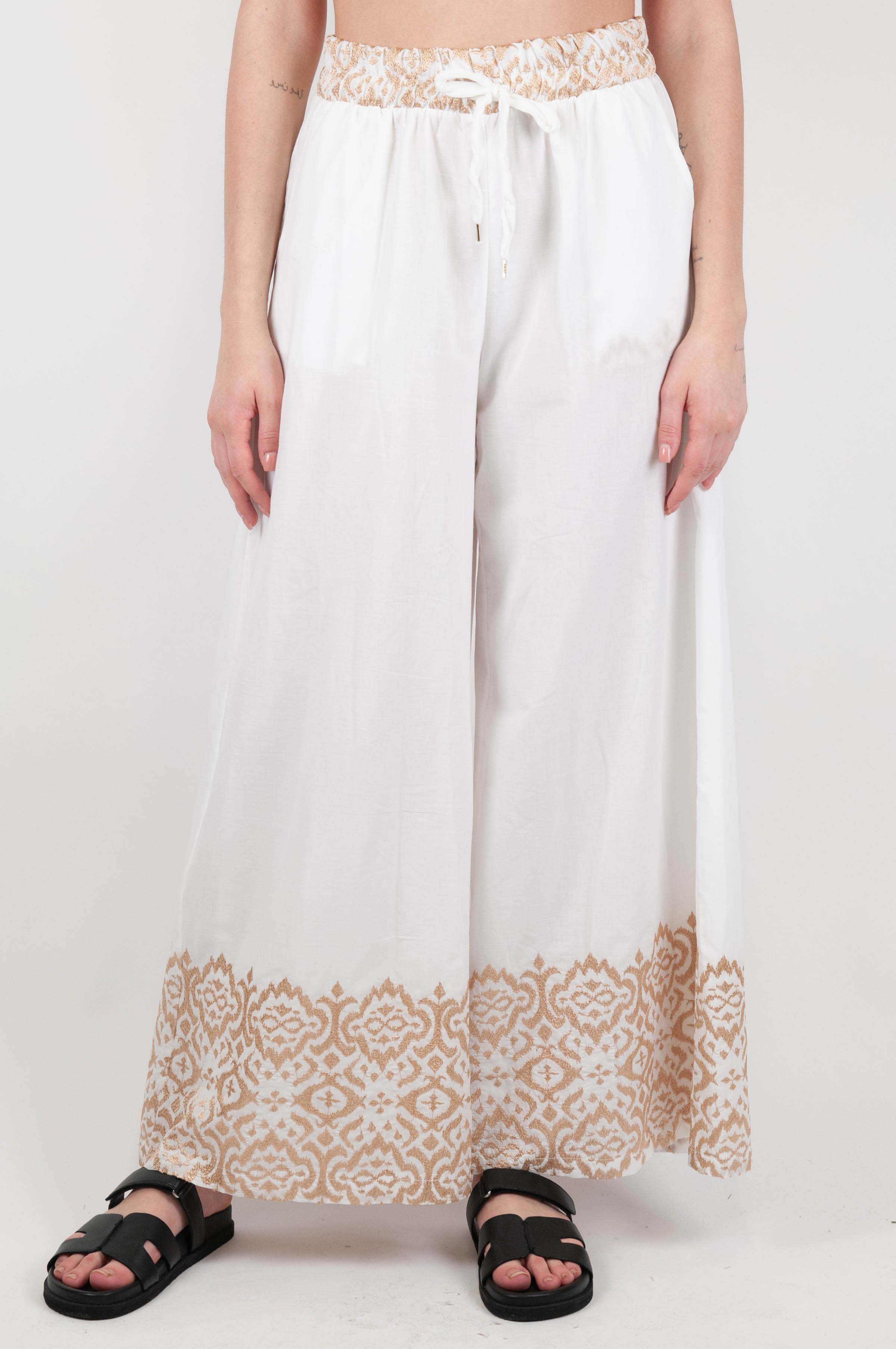 Tension in - Palazzo trousers with embroidery on the bottom and drawstring