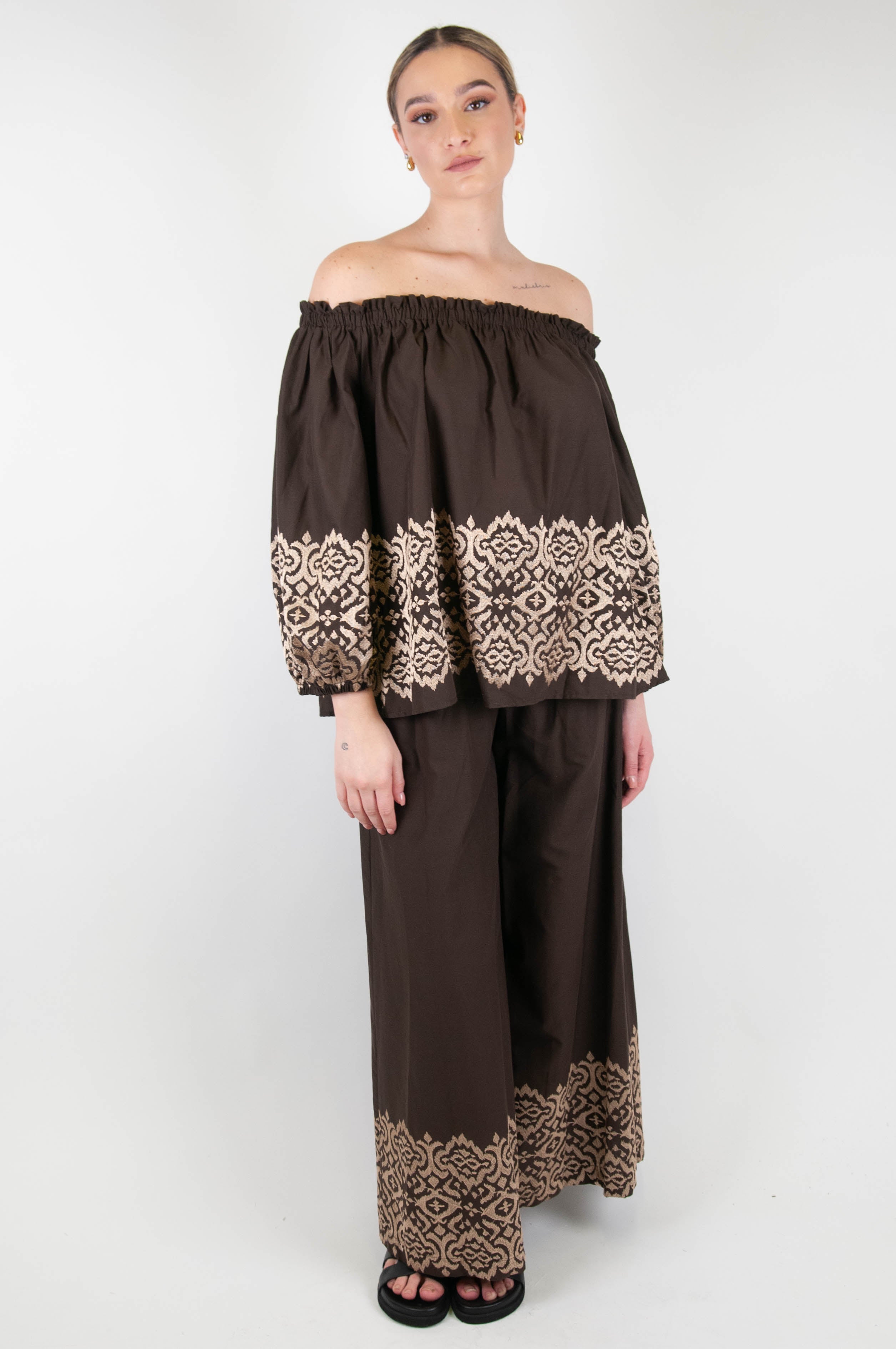 Tension in - Palazzo trousers with embroidery on the bottom and drawstring