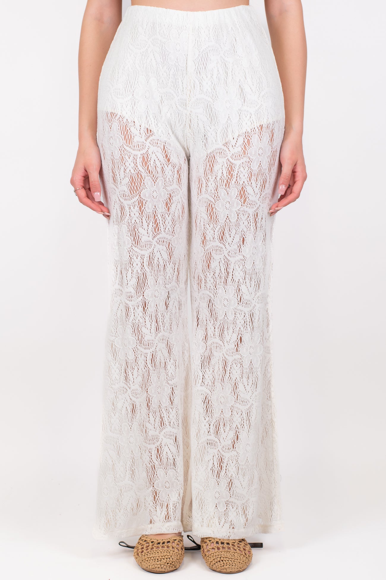 Tensione in - Pantalone palazzo in pizzo con coulotte ed elastico in vita
