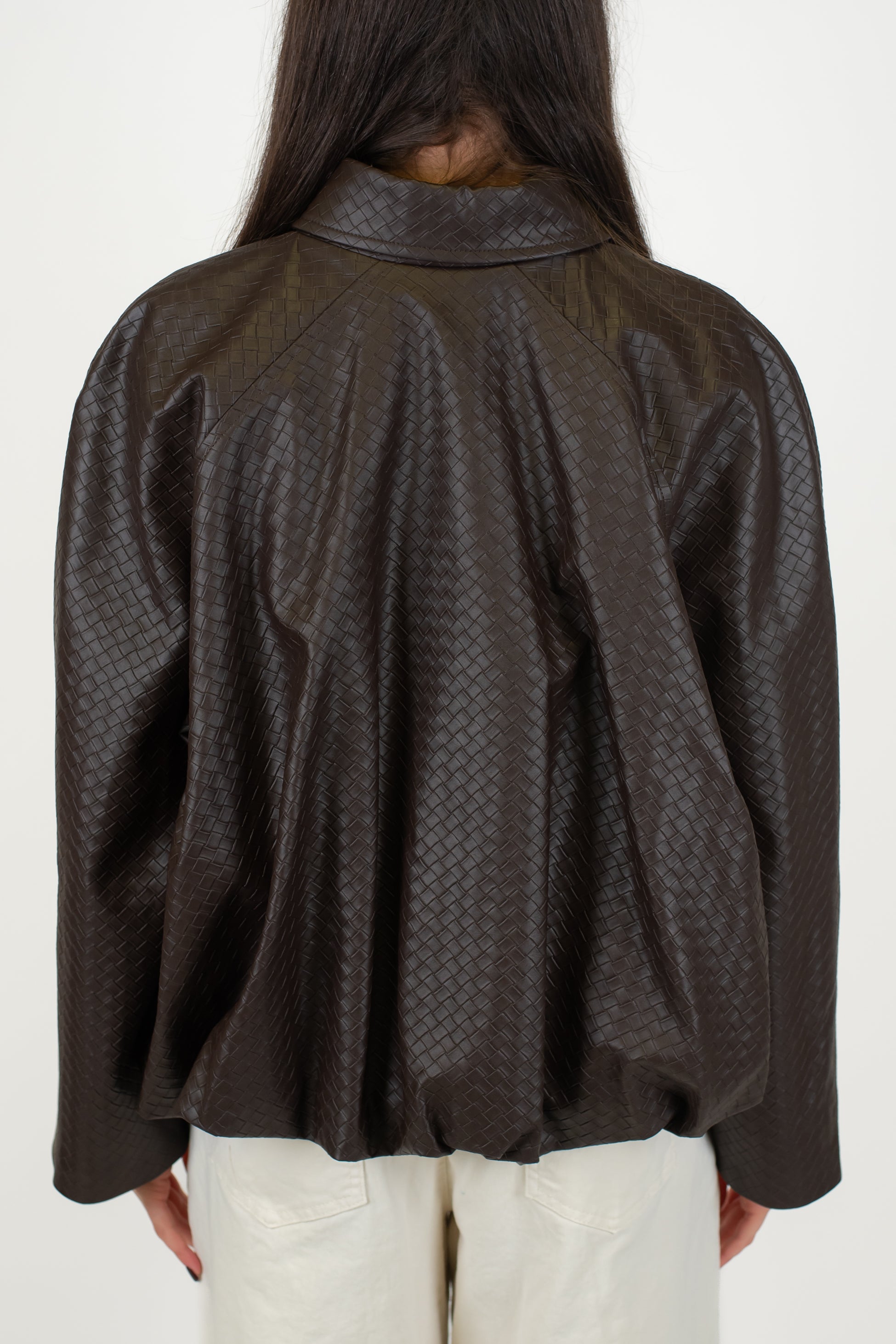 Tensione in - Bomber in ecopelle intracciata con chiusura bottoni