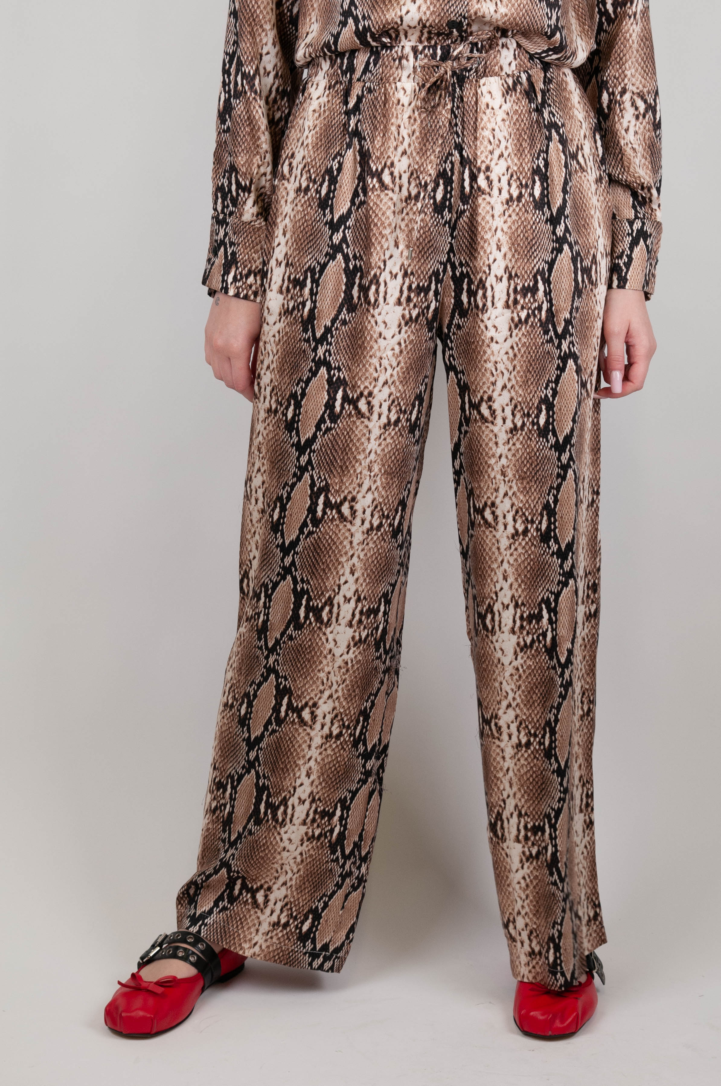Tension in - Python animal print trousers in viscose with drawstring