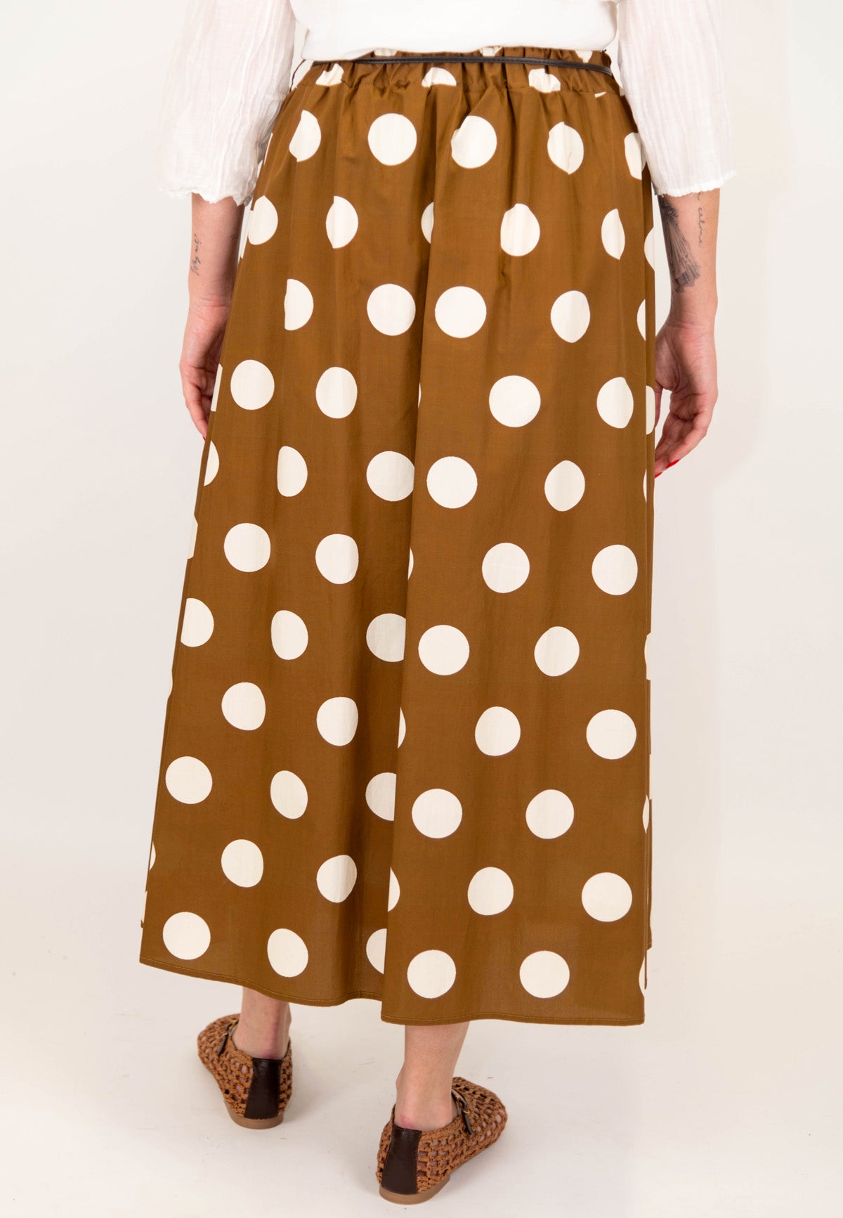 Tensione in - Gonna fantasia pois con pieghe ed elastico sul retro