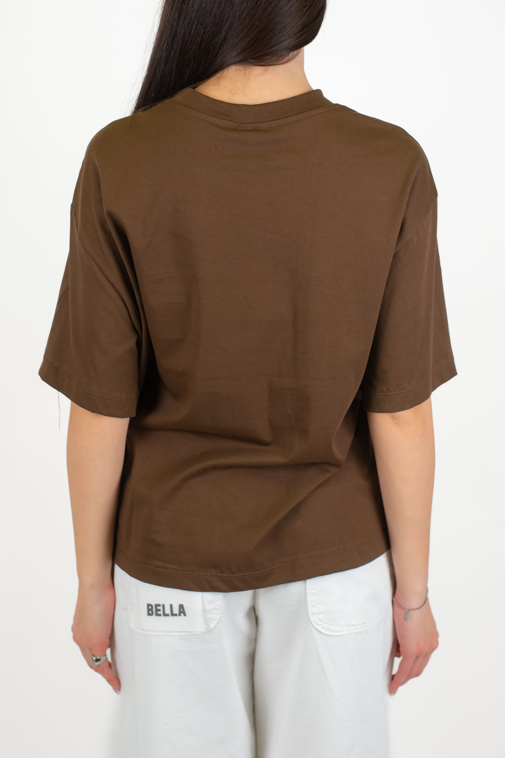 Tensione in - T-shirt over con taschino paillettes a contrasto