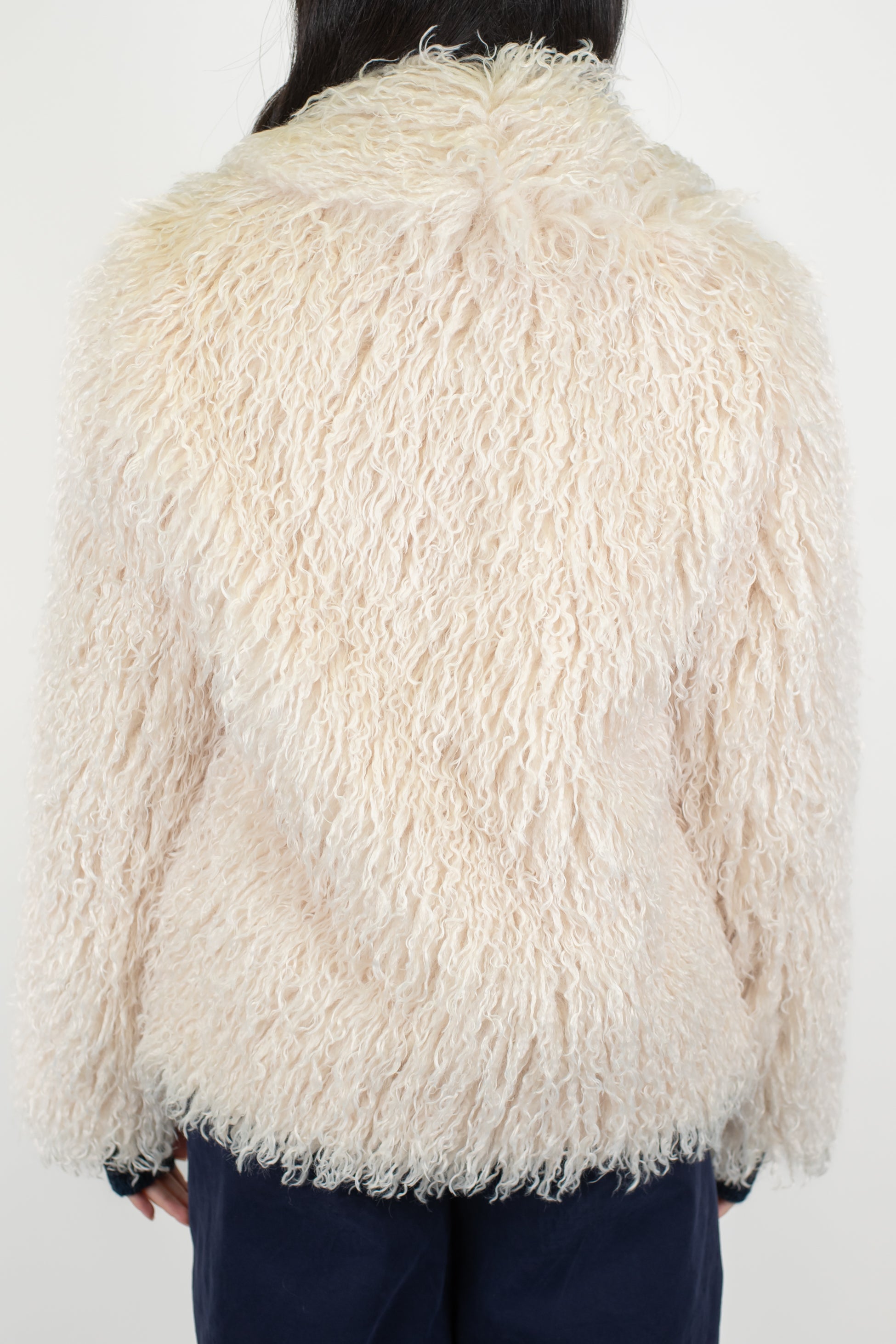 Tensione in - Ecopelliccia mongolia con chiusura a gancio