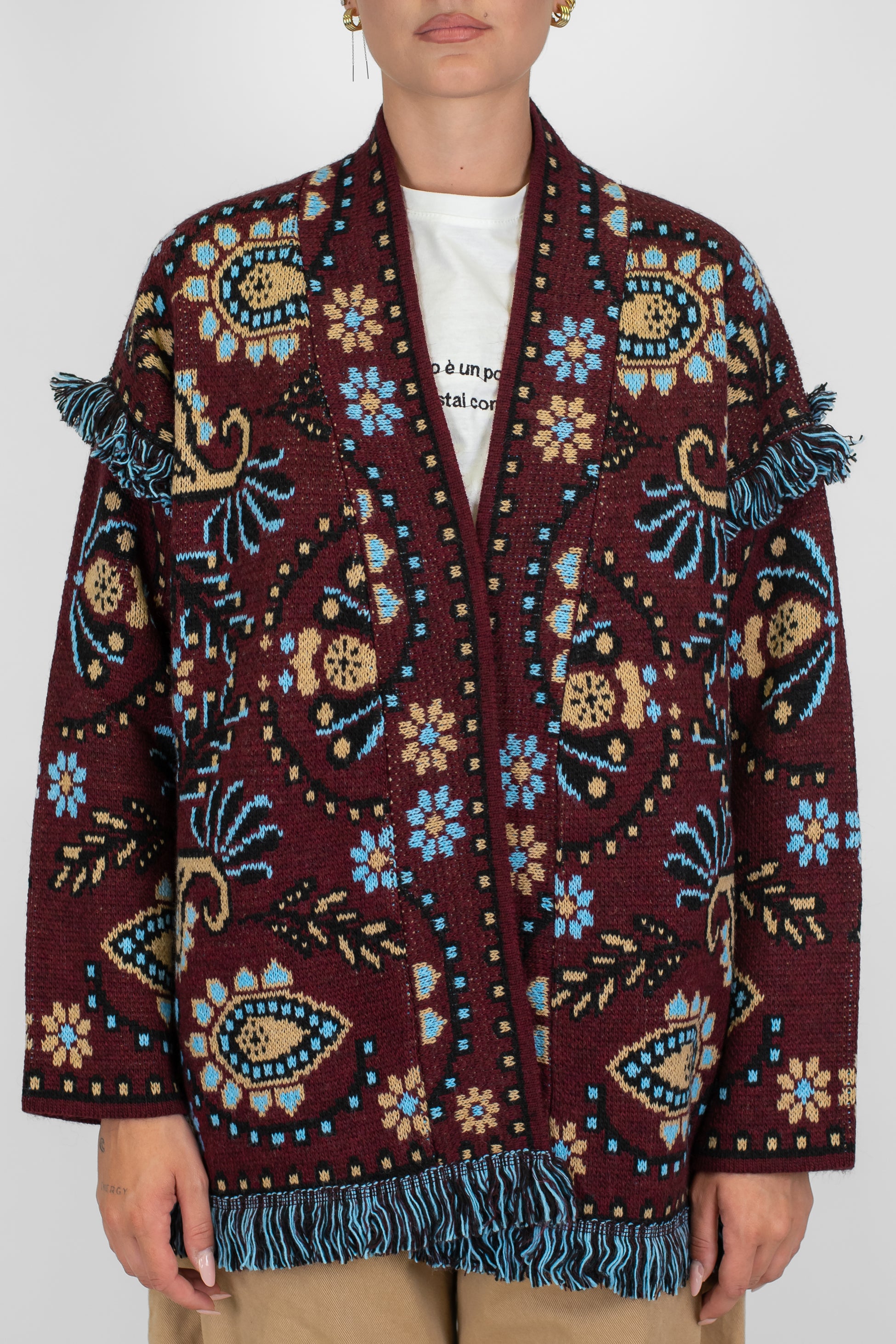 Tensione in - Cardigan aperto fantasia astratta in misto lana con nappine