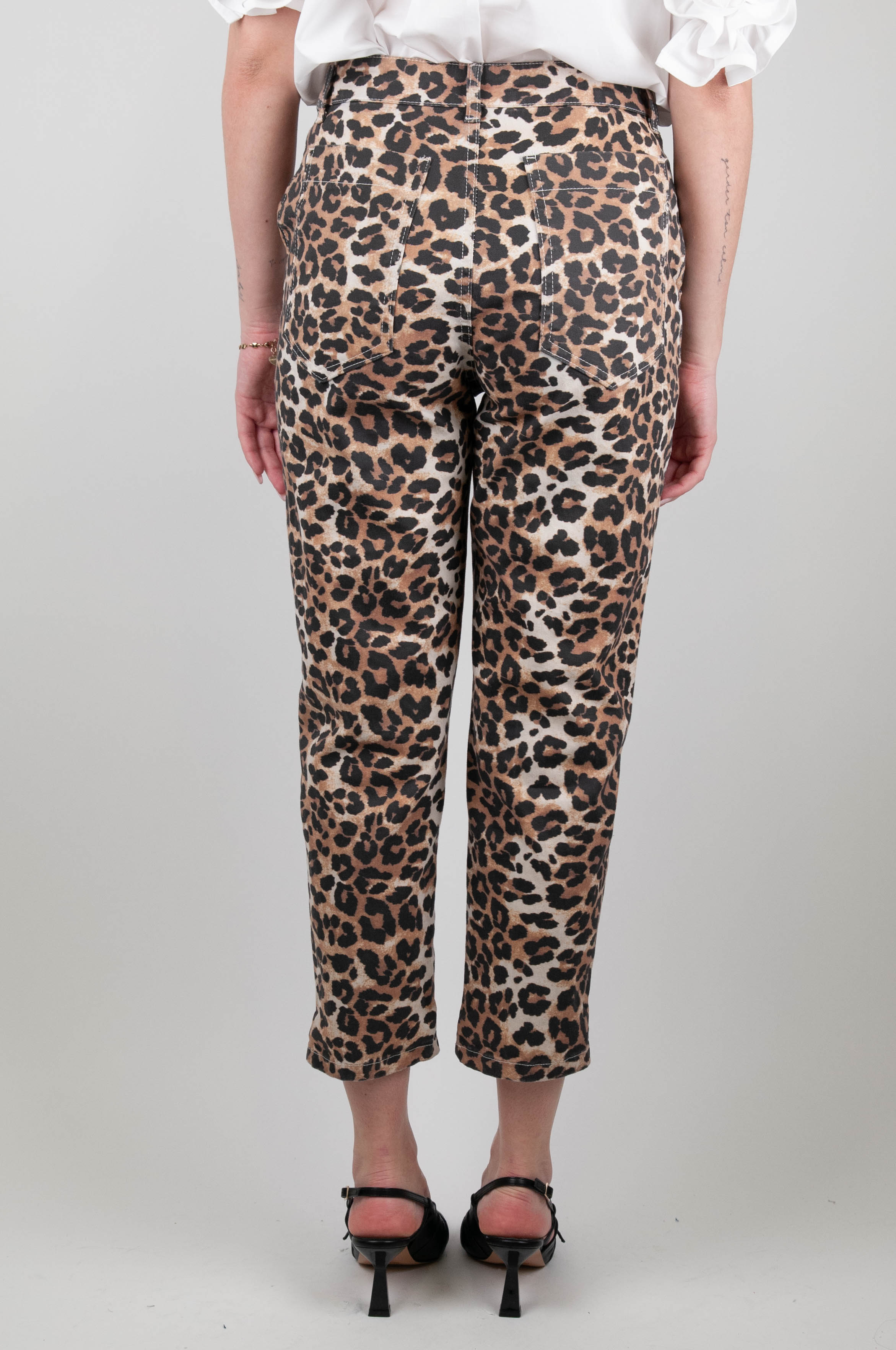 Tensione in - Pantalone fantasia animalier con bottoni gioiello