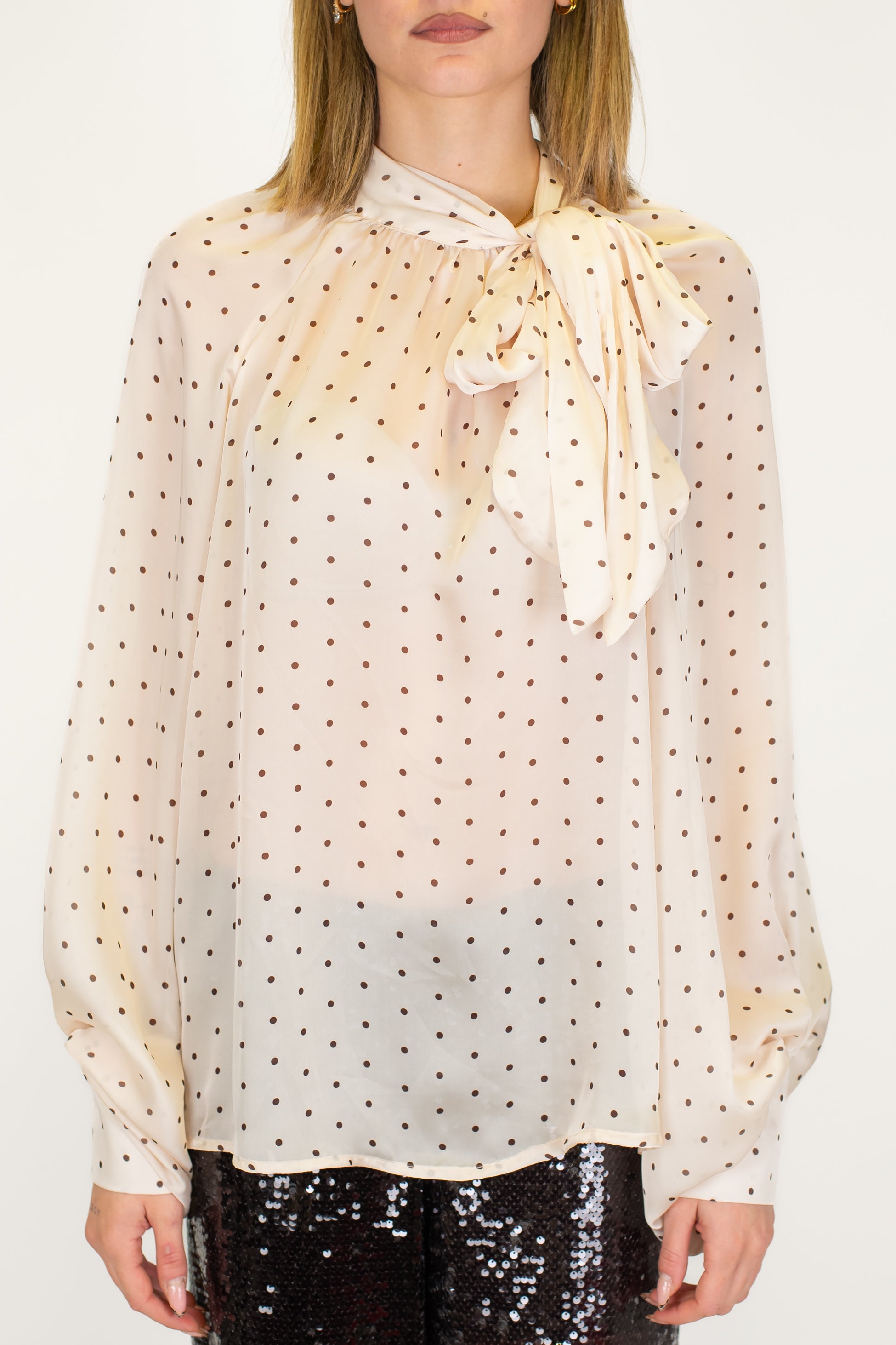 Tensione in -Blusa fantasia pois con fiocco al collo