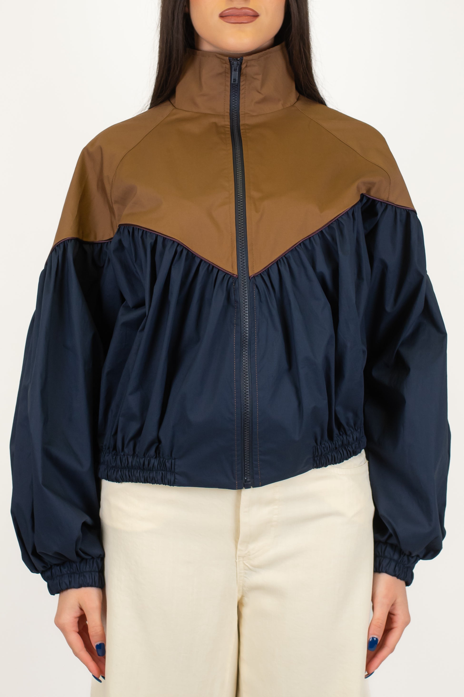 Tensione in - Bomber doppio colore con chiusura zip ed elastico in vita