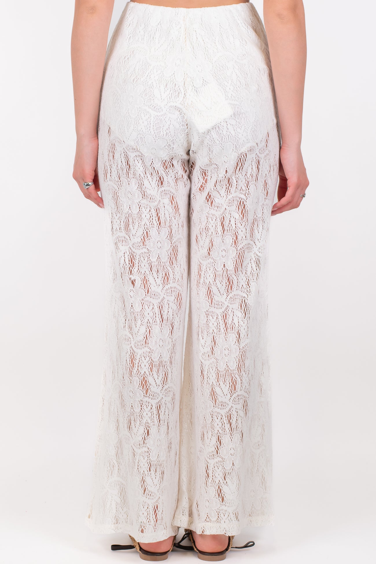 Tensione in - Pantalone palazzo in pizzo con coulotte ed elastico in vita