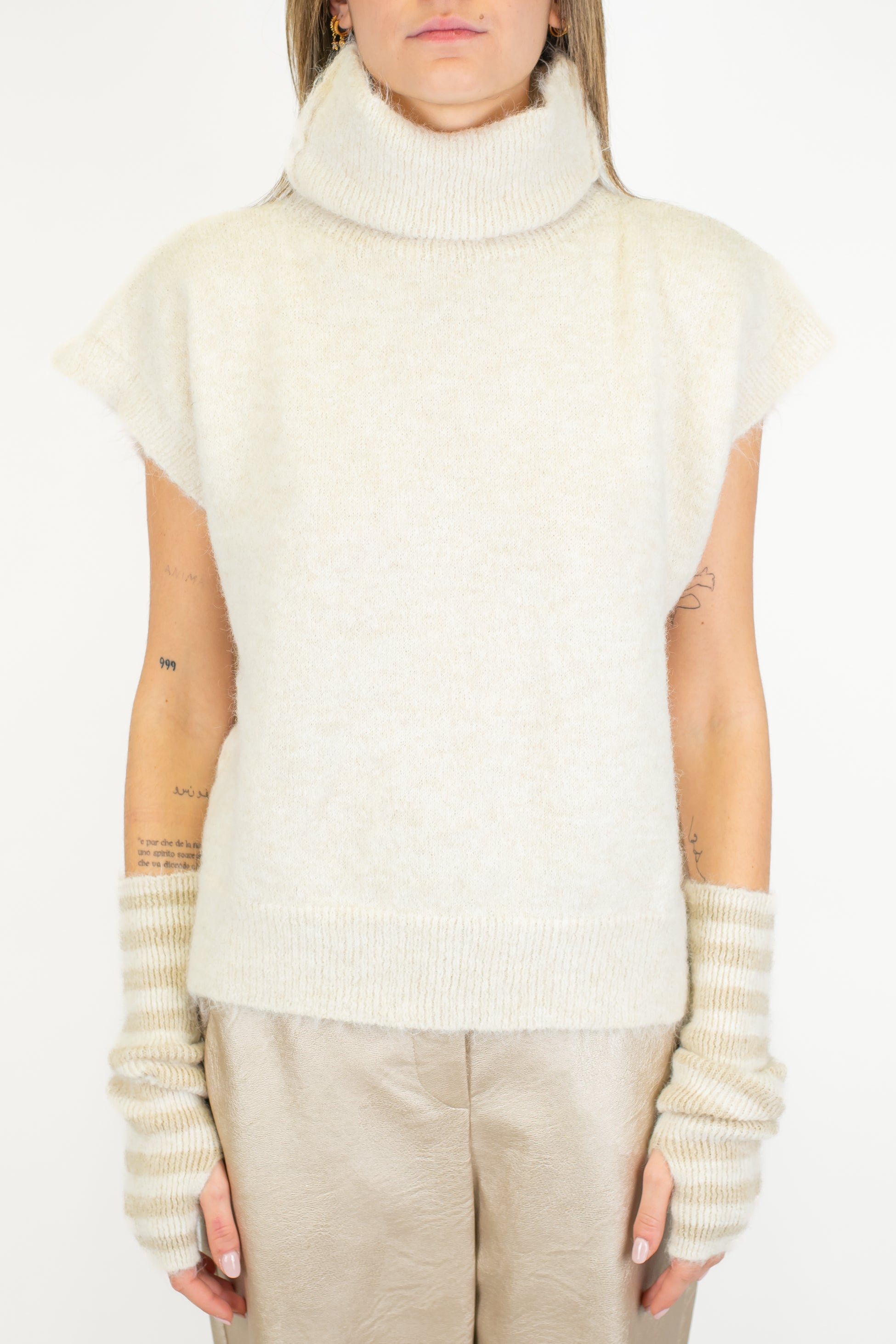 Tensione in - Dolcevita giromaniche in misto lana con manicotti fantasia a righe