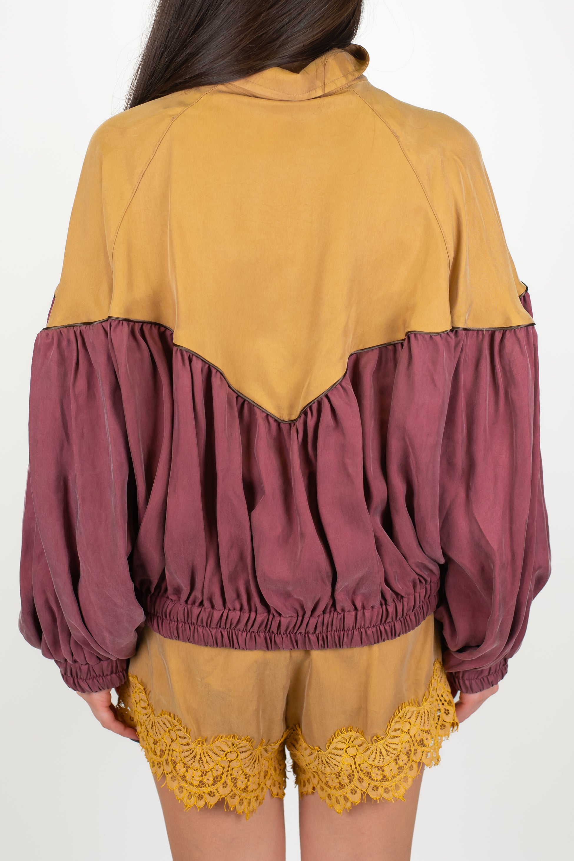 Tensione in - Bomber in cupro con fondo a contrasto ed elastico