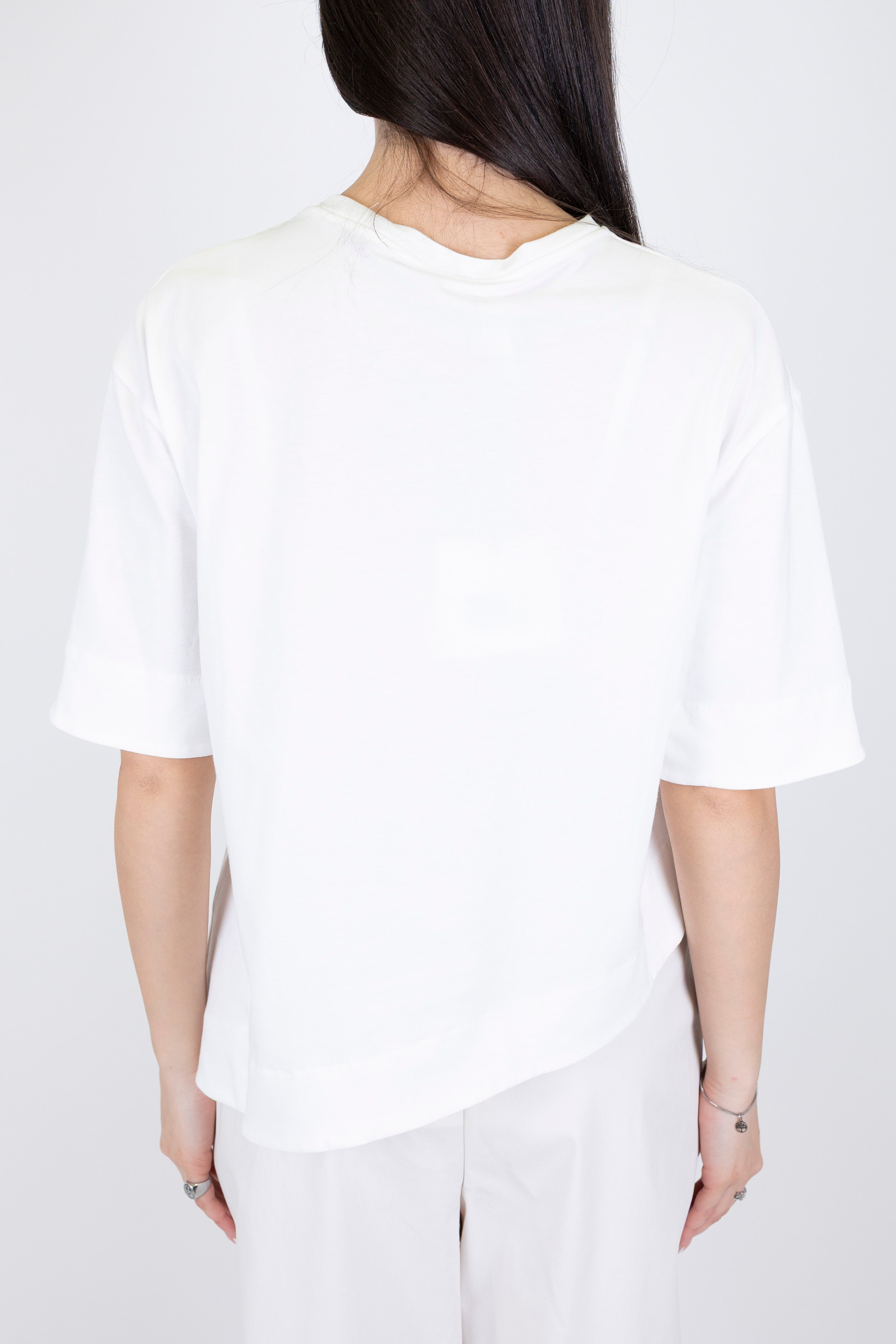 Tensione in - T-shirt over con taschino paillettes