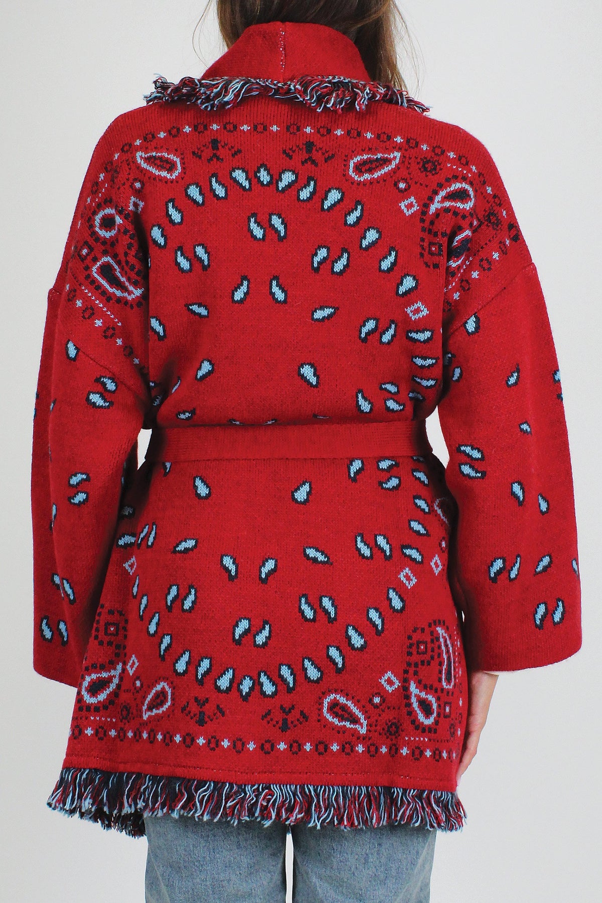 Tensione in - Cardigan fantasia bandana in misto lana con profilo frange e chiusura con cintura in tessuto