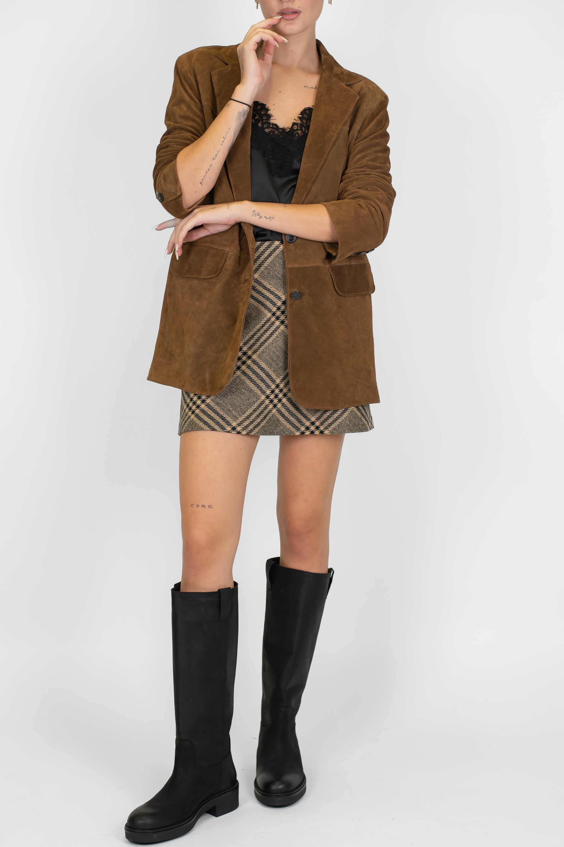 Tensione in - Minigonna fantasia quadro in misto lana con chiusura zip sul retro